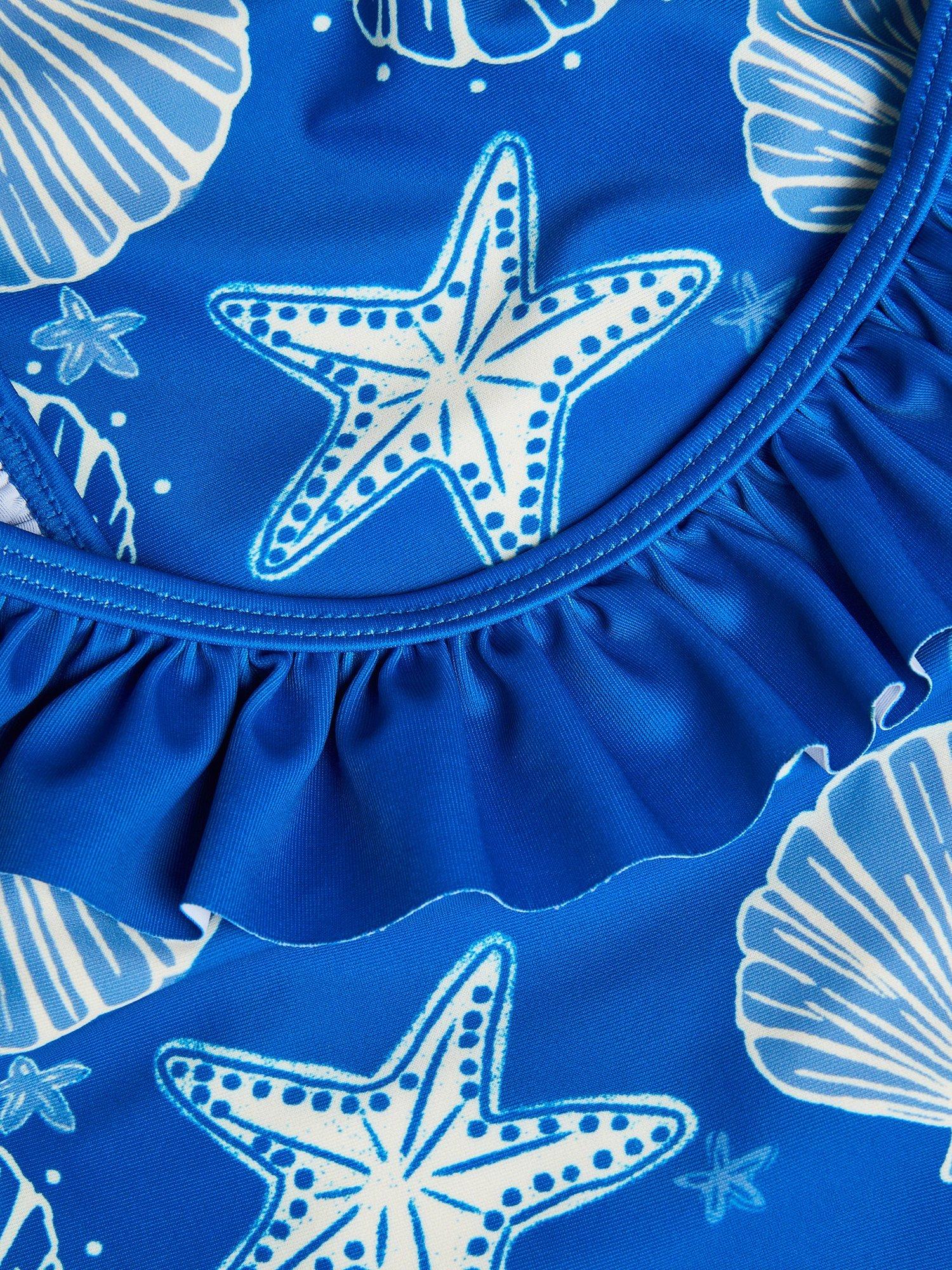 Product image 3 of 3, which shows Monsoon Kids' Seashell Print Frill Swimsuit, Navy, 3-4 years