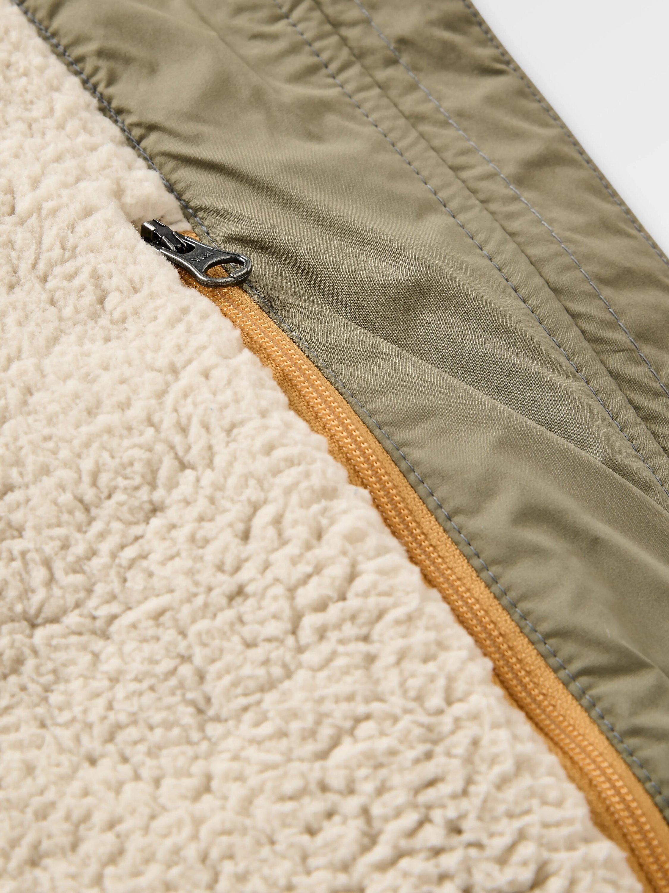 Product image 7 of 9, which shows Passenger Flora Sherpa Lined Gilet, Green, S