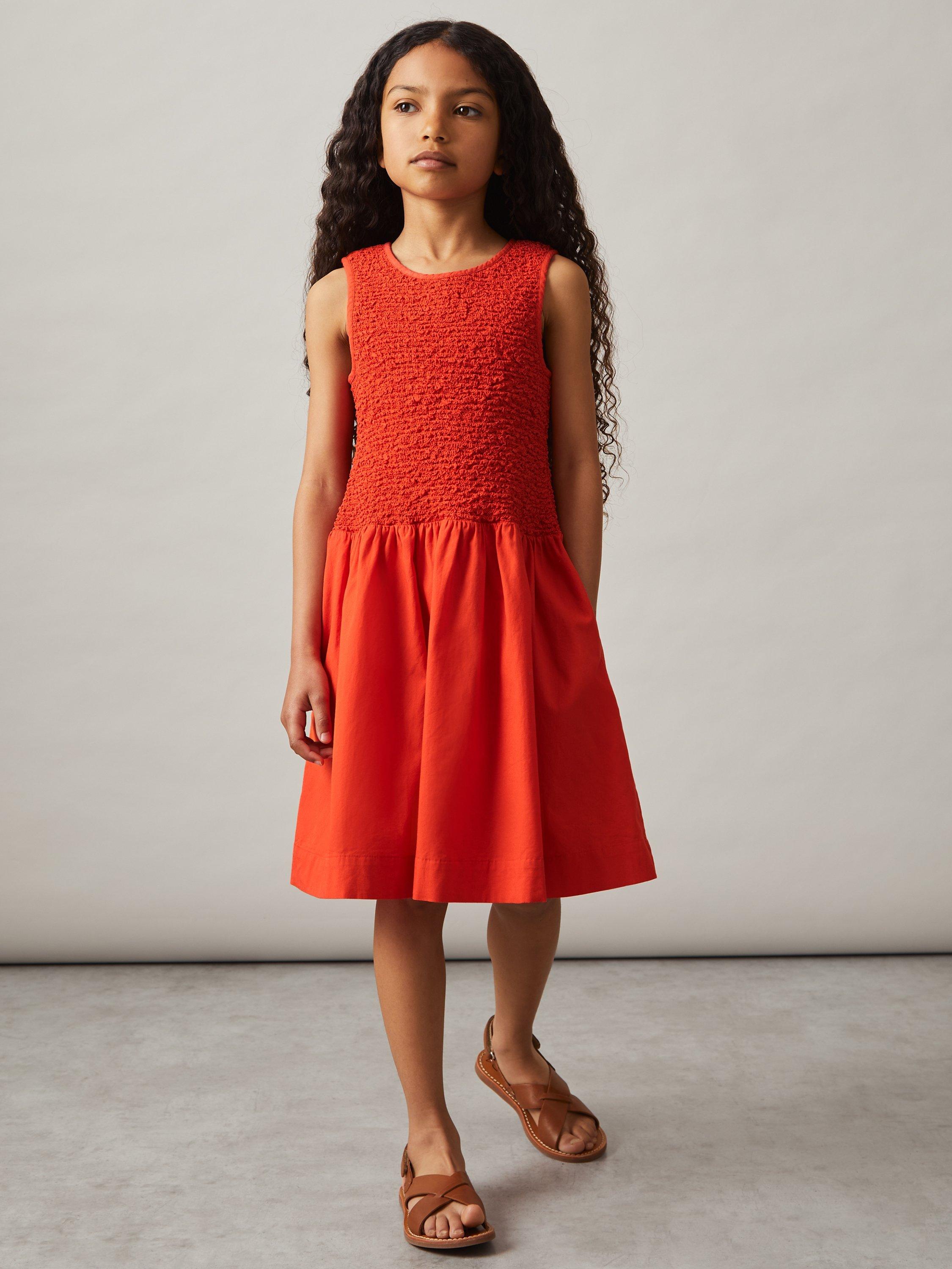 Product image 1 of 4, which shows Reiss Kids' Annabella Cotton Sleeveless Shirred Dress, Red, 4-5 years