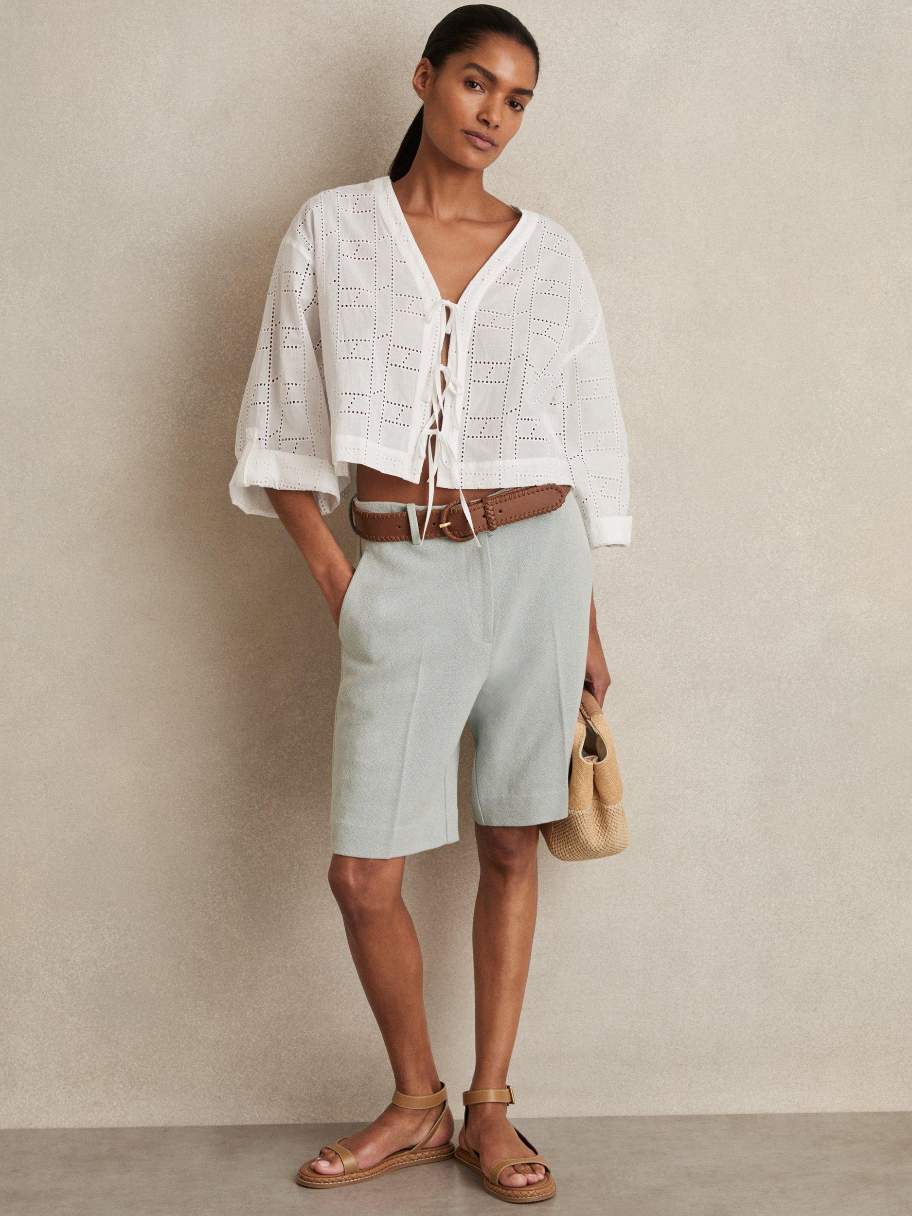Product image 2 of 5, which shows Reiss Nadia Broderie Anglaise Tie Front Top, White, XS