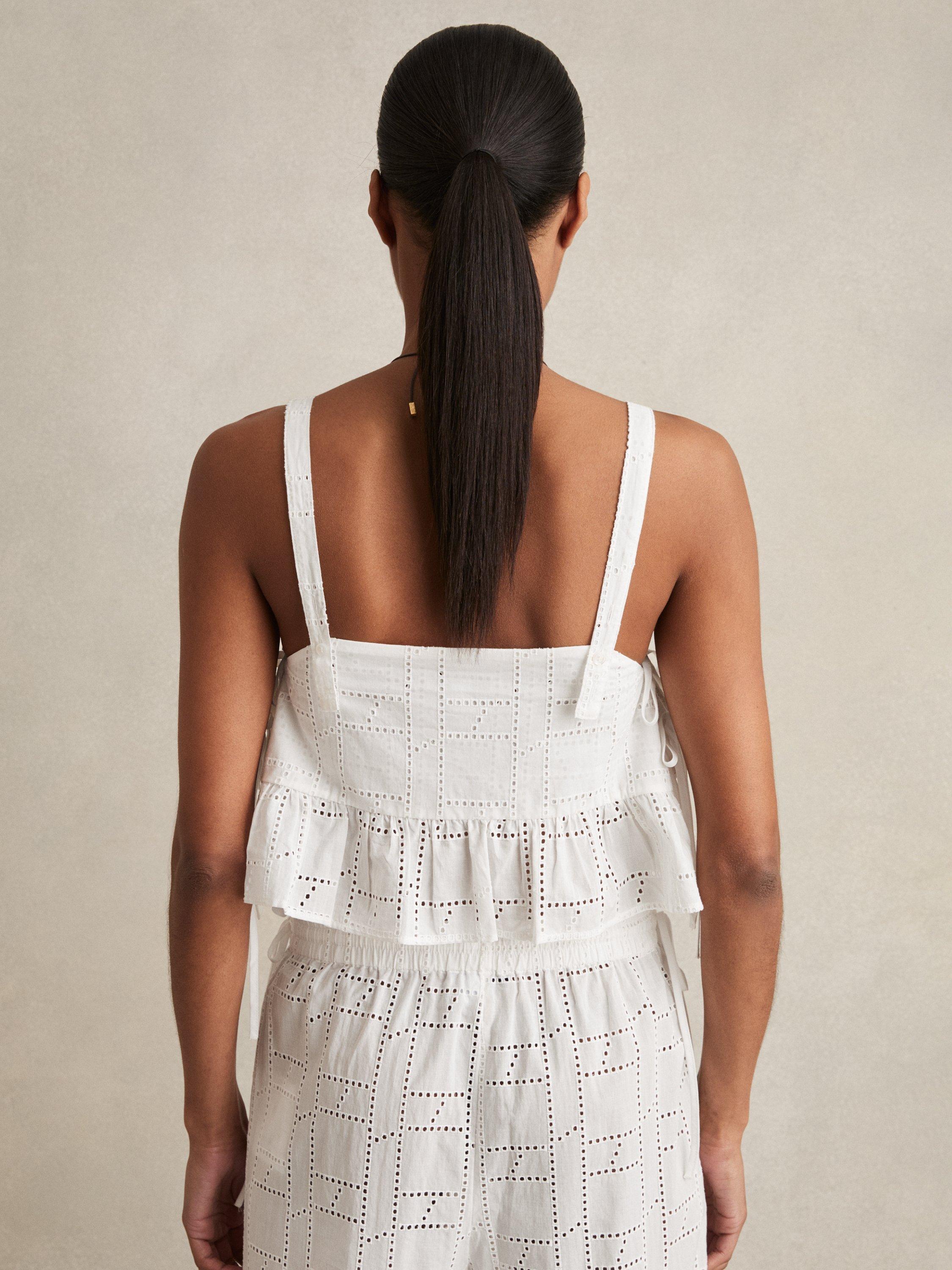 Product image 4 of 5, which shows Reiss Poppy Broderie Anglaise Side Tie Top, White, XS