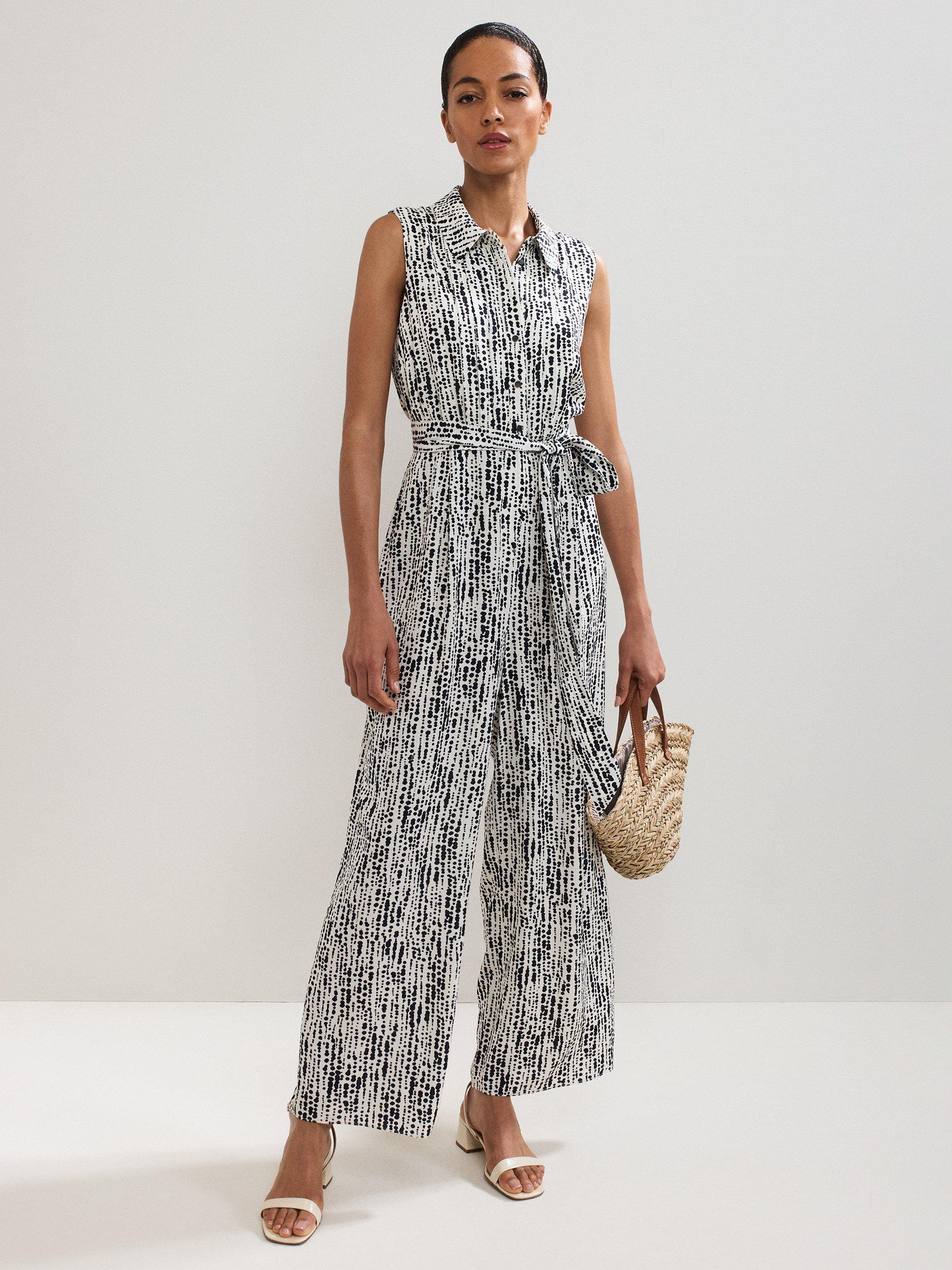 Product image 1 of 7, which shows Phase Eight Janine Sleeveless Spot Print Jumpsuit, Black/Ivory, 6