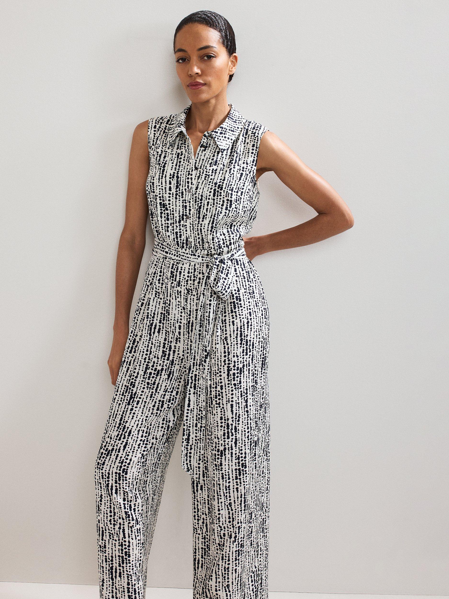 Product image 3 of 7, which shows Phase Eight Janine Sleeveless Spot Print Jumpsuit, Black/Ivory, 6