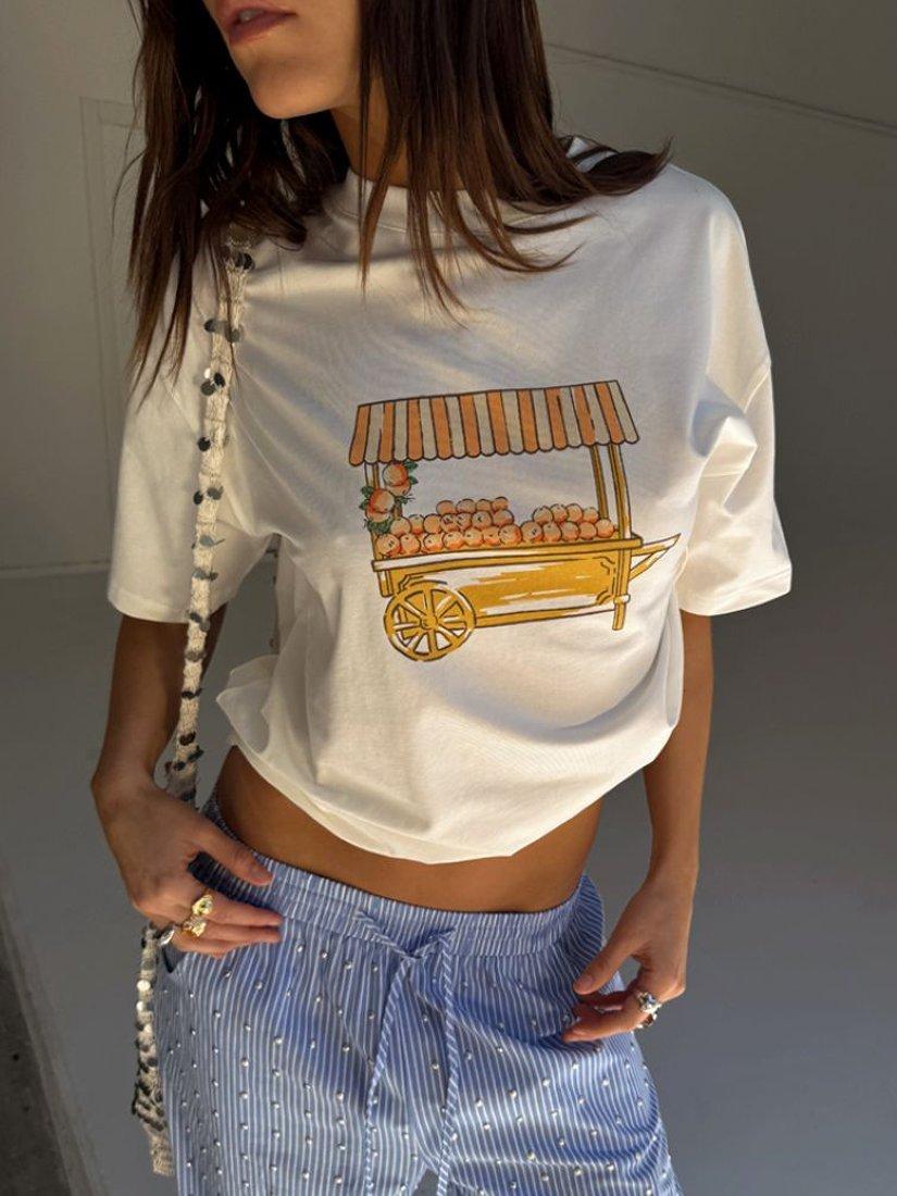 Product image 1 of 5, which shows Never Fully Dressed Orange Cart T-Shirt, White, XS