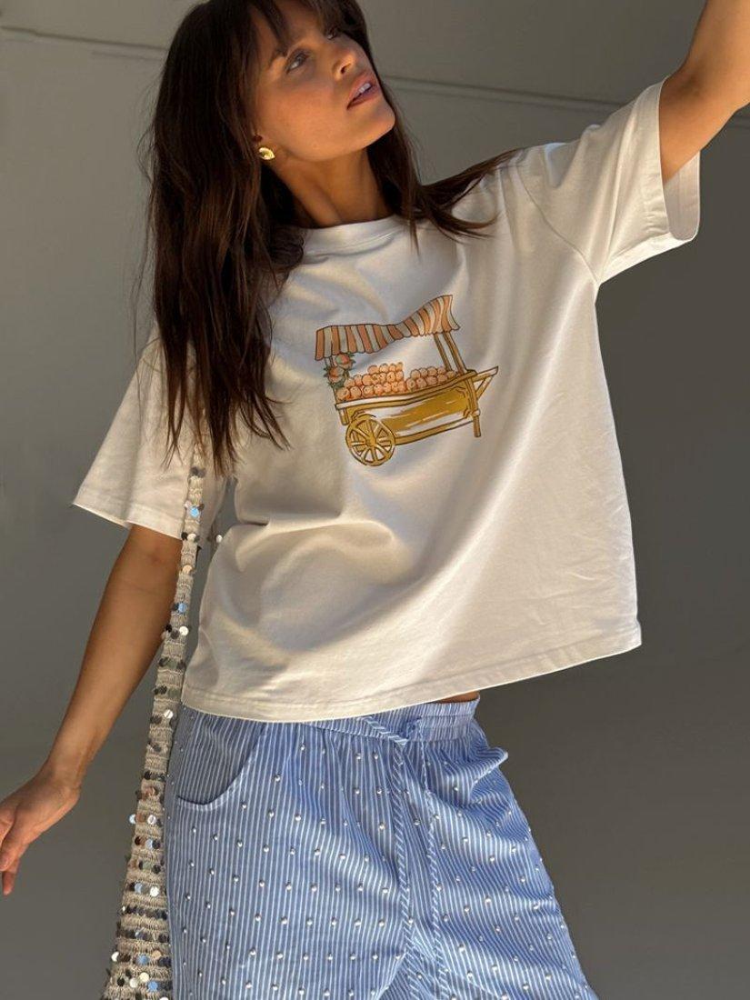 Product image 2 of 5, which shows Never Fully Dressed Orange Cart T-Shirt, White, XS