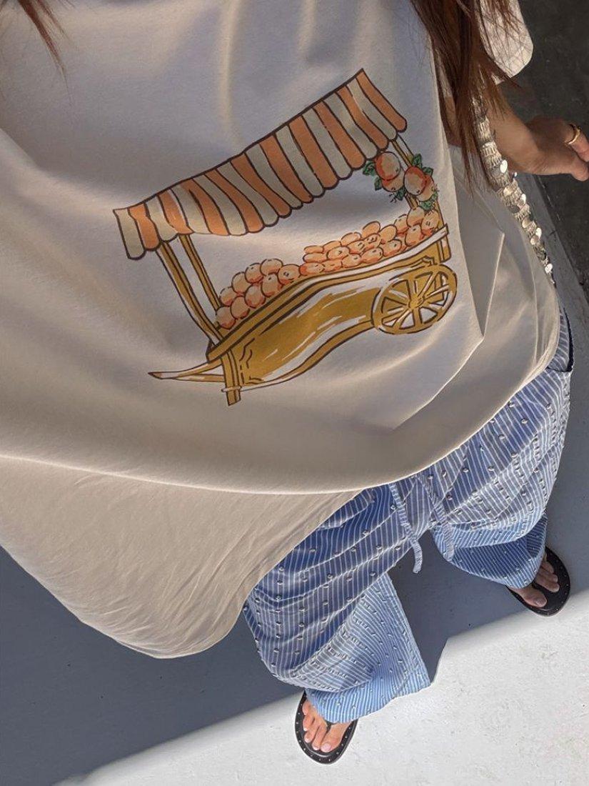 Product image 4 of 5, which shows Never Fully Dressed Orange Cart T-Shirt, White, XS