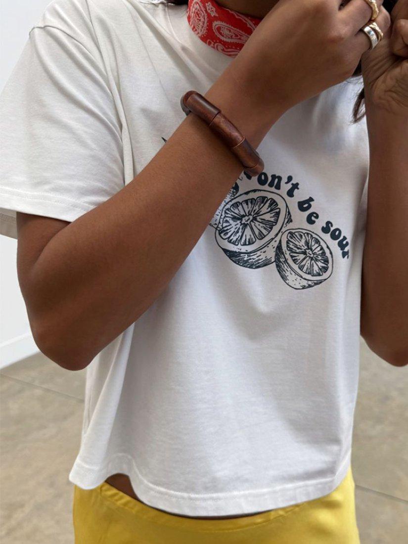 Product image 3 of 5, which shows Never Fully Dressed Don't Be Sour T-Shirt, White, XS