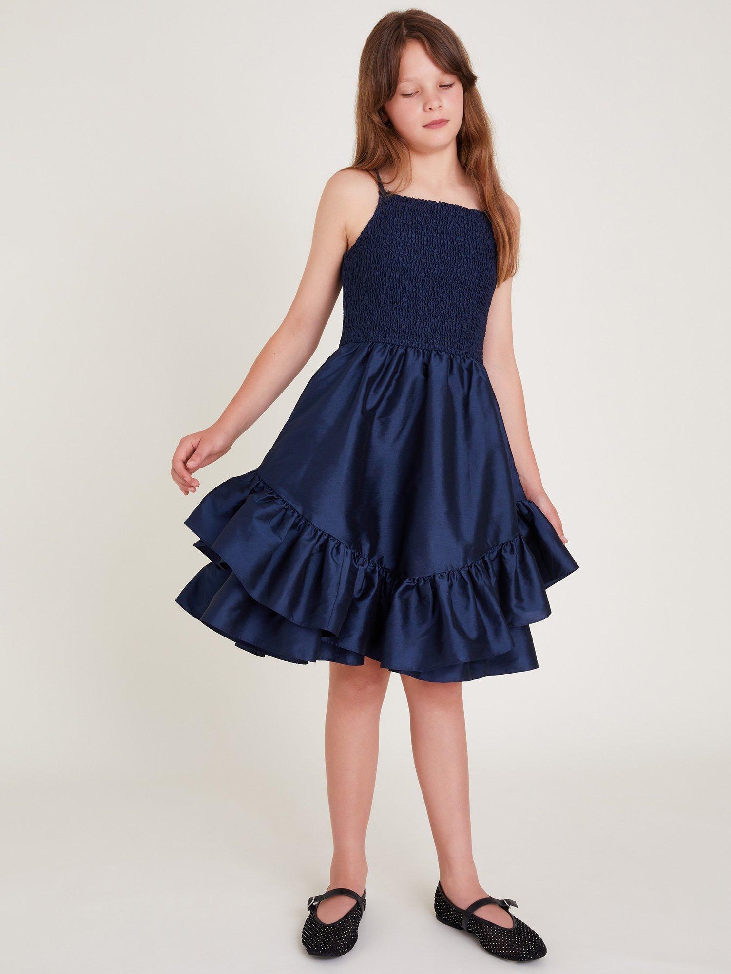 Product image 1 of 4, which shows Monsoon Kids' Clariska Sleeveless Shirred Dress, Navy, 9 years