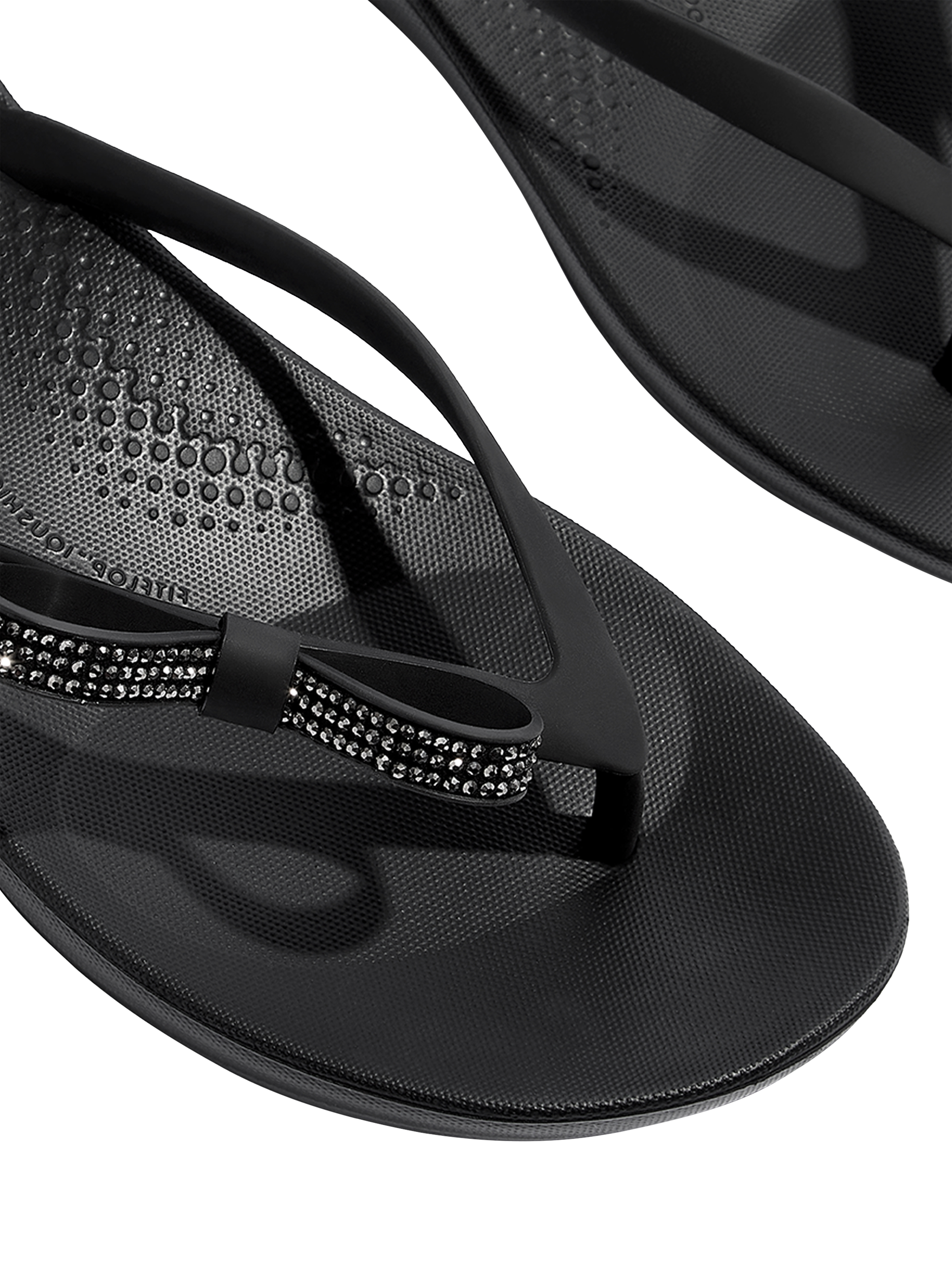 Product image 3 of 5, which shows FitFlop iQushion Glitz Bow Flip Flops, Black, 3