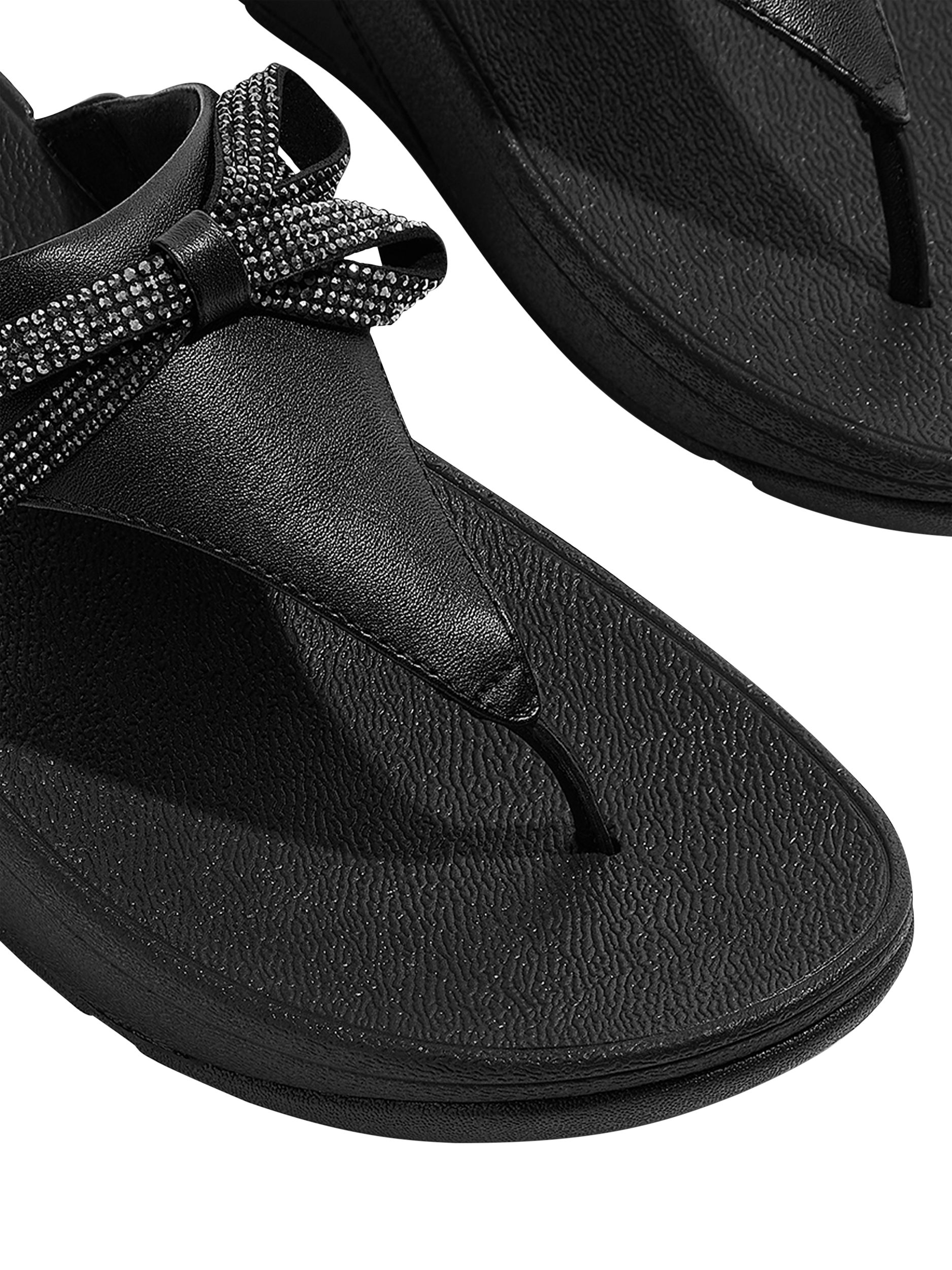 Product image 3 of 5, which shows FitFlop Lulu Glitz Bow Leather Toe-Post Sandals, All Black, 3