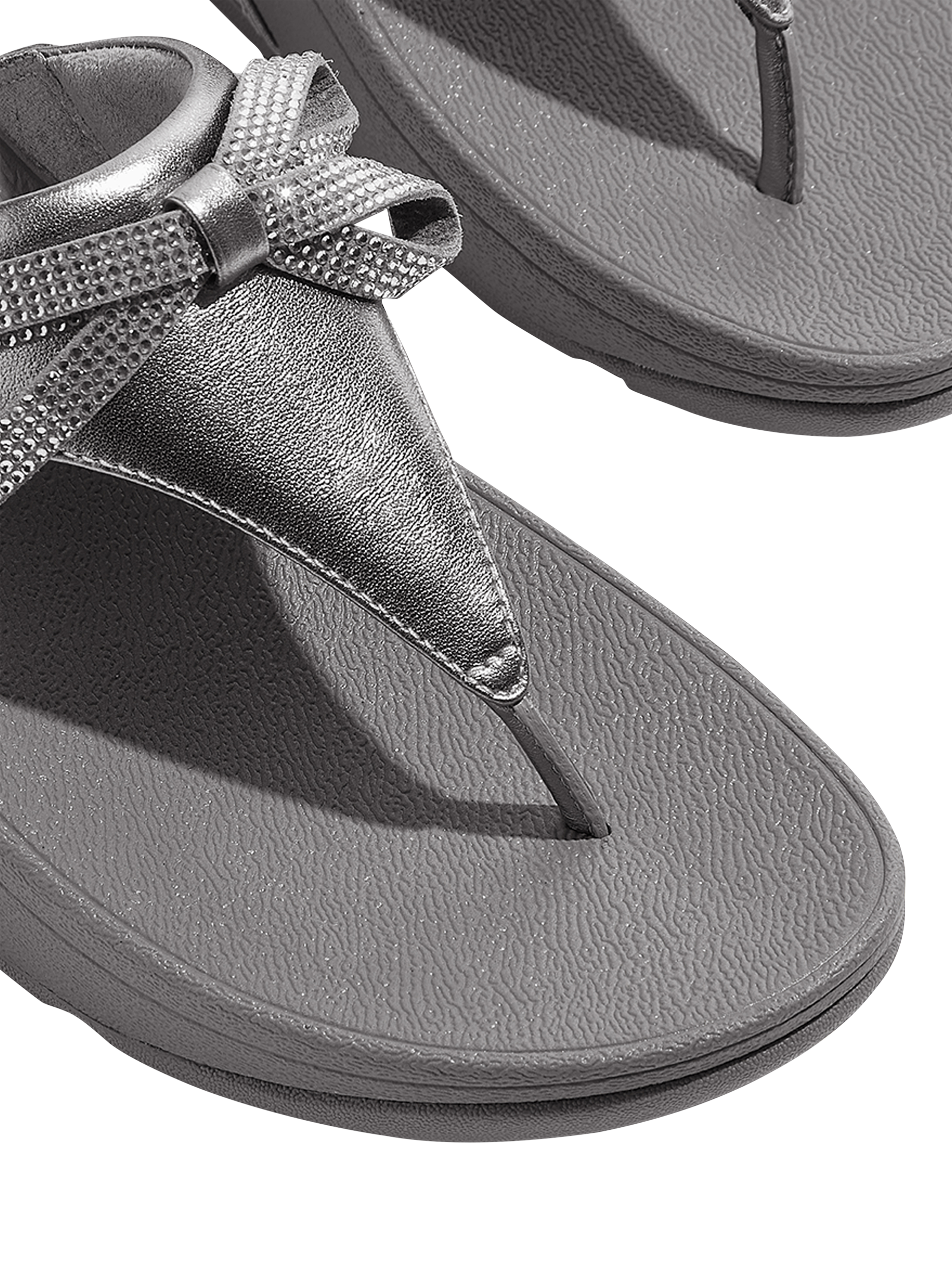 Product image 3 of 5, which shows FitFlop Lulu Glitz Bow Leather Toe-Post Sandals, Silvereen, 3