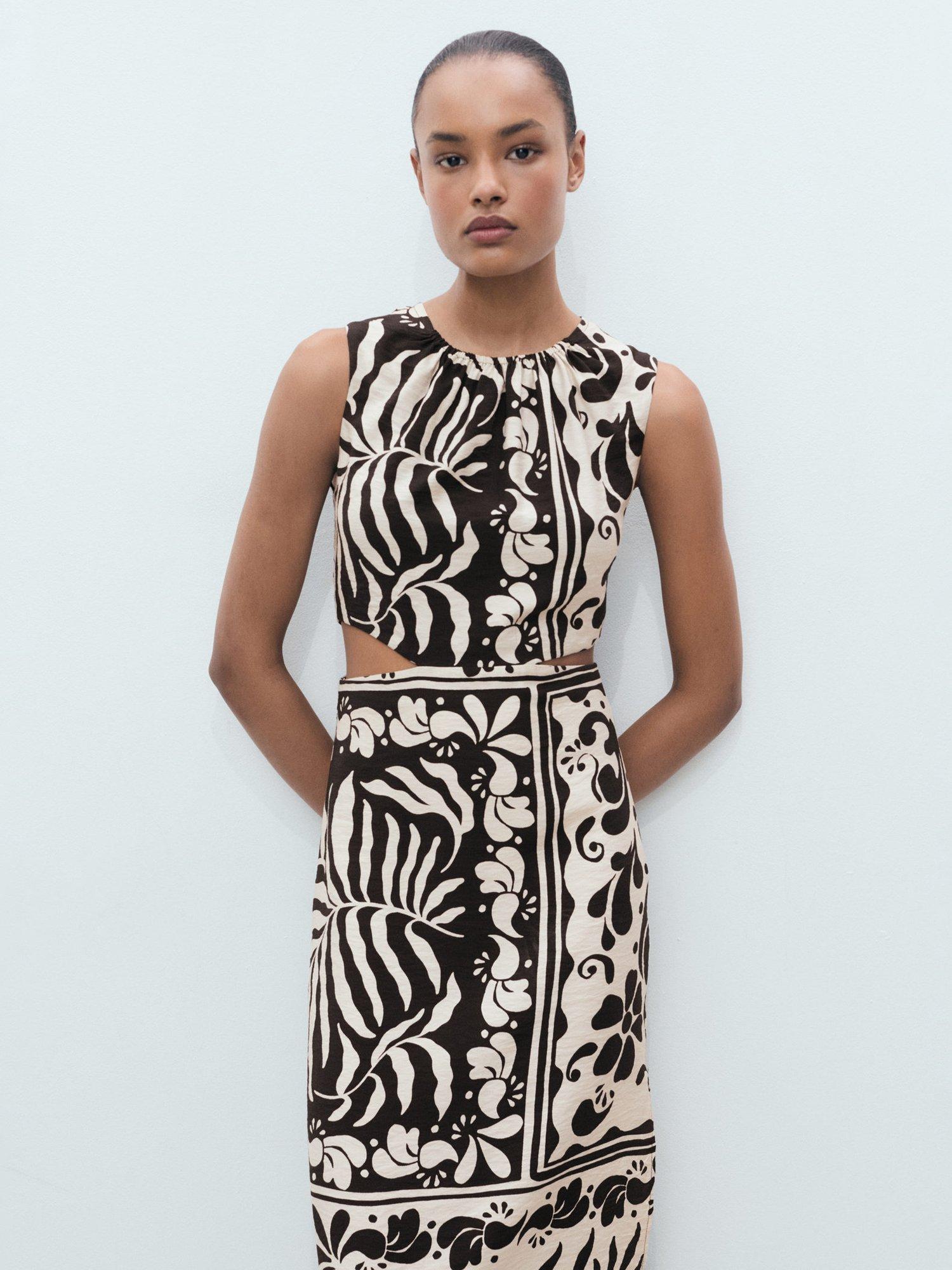 Product image 1 of 9, which shows Mango Olimpio Printed Cut-out Round Neck Midi Dress, Black, 10