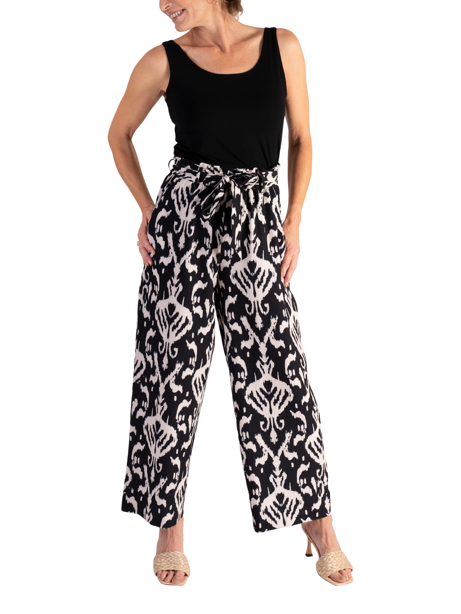 Product image 3 of 6, which shows chesca Ikat Print Pull On Wide Leg Trousers, Black/Multi, 18-20