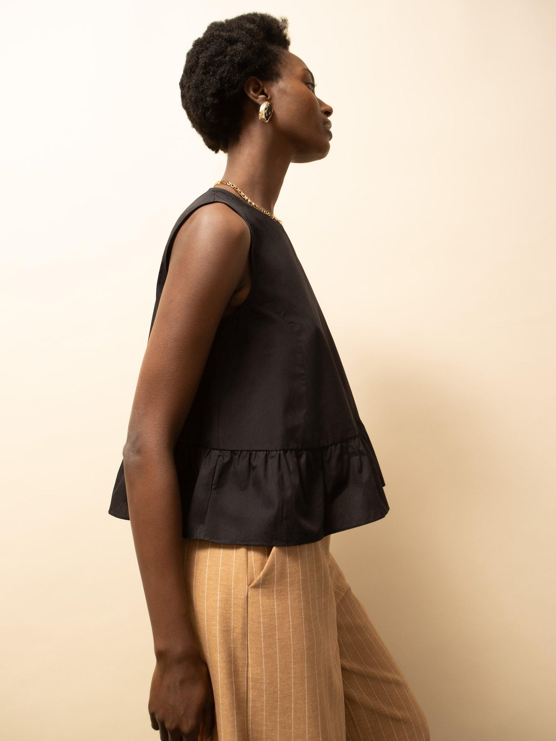 Product image 4 of 6, which shows Ro&Zo Frill Hem Sleeveless Top, Black, 6