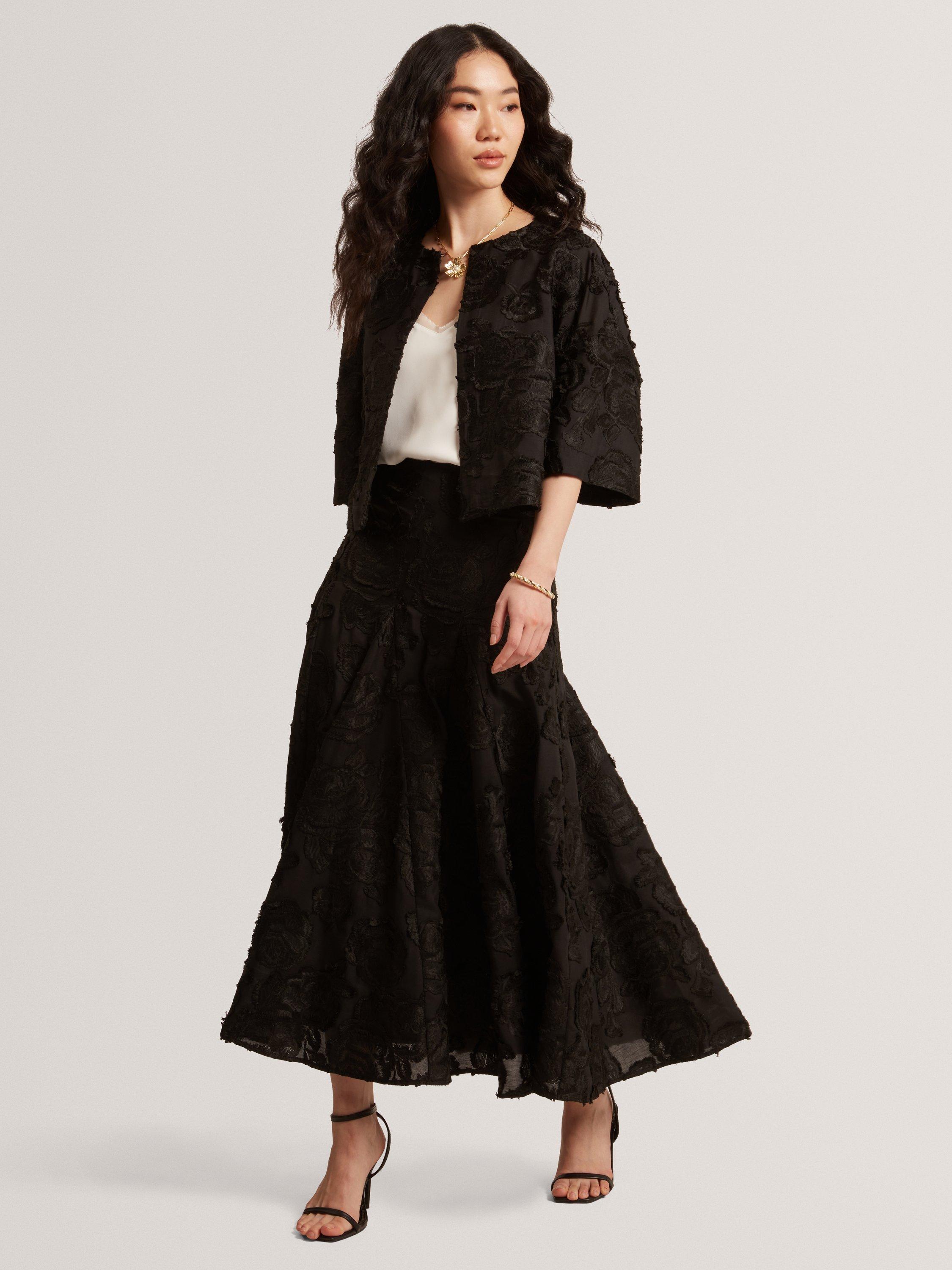 Product image 1 of 8, which shows Ted Baker Textured Rose Detail Midi Skirt, Black, 6