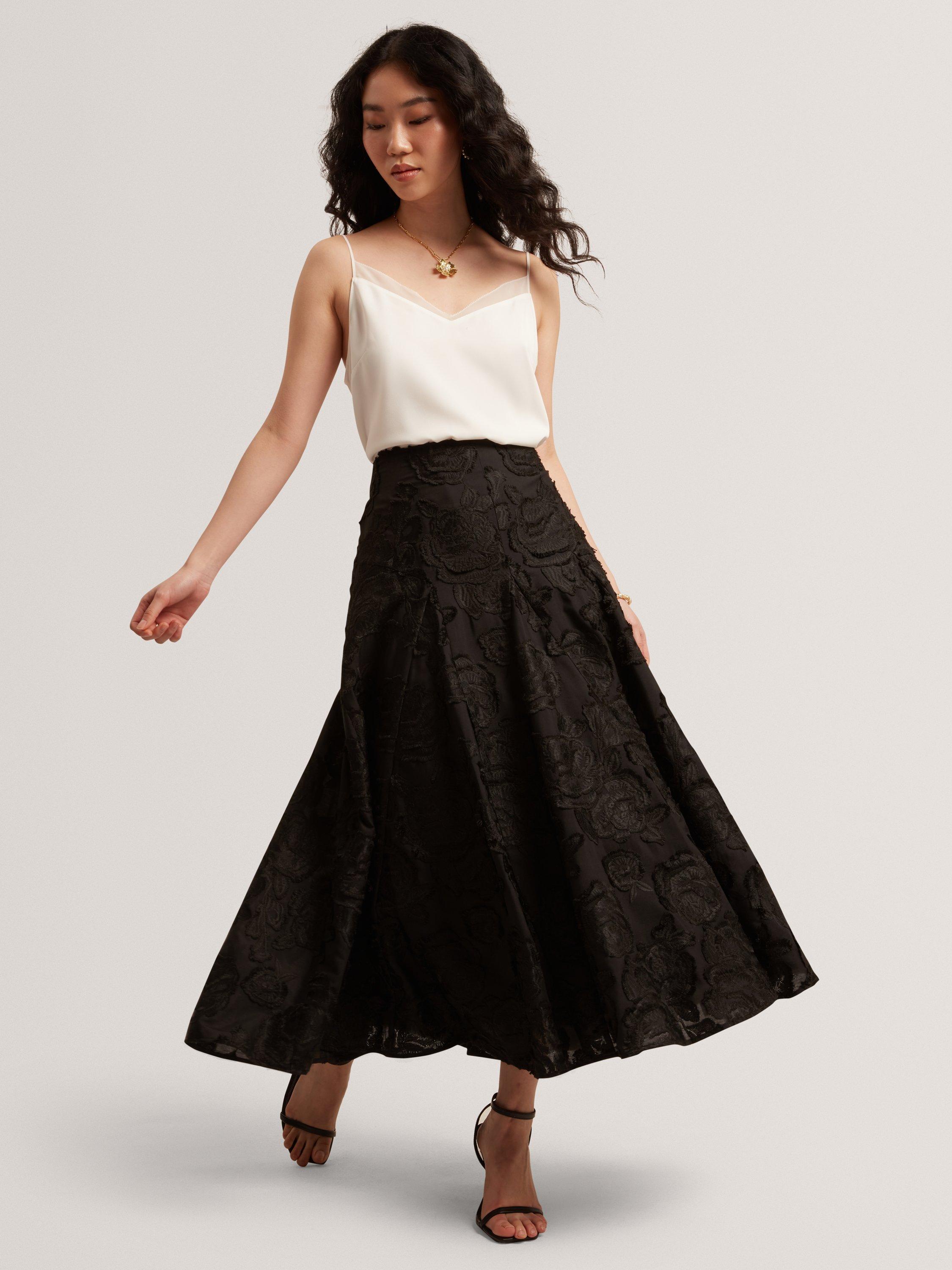 Product image 3 of 8, which shows Ted Baker Textured Rose Detail Midi Skirt, Black, 6