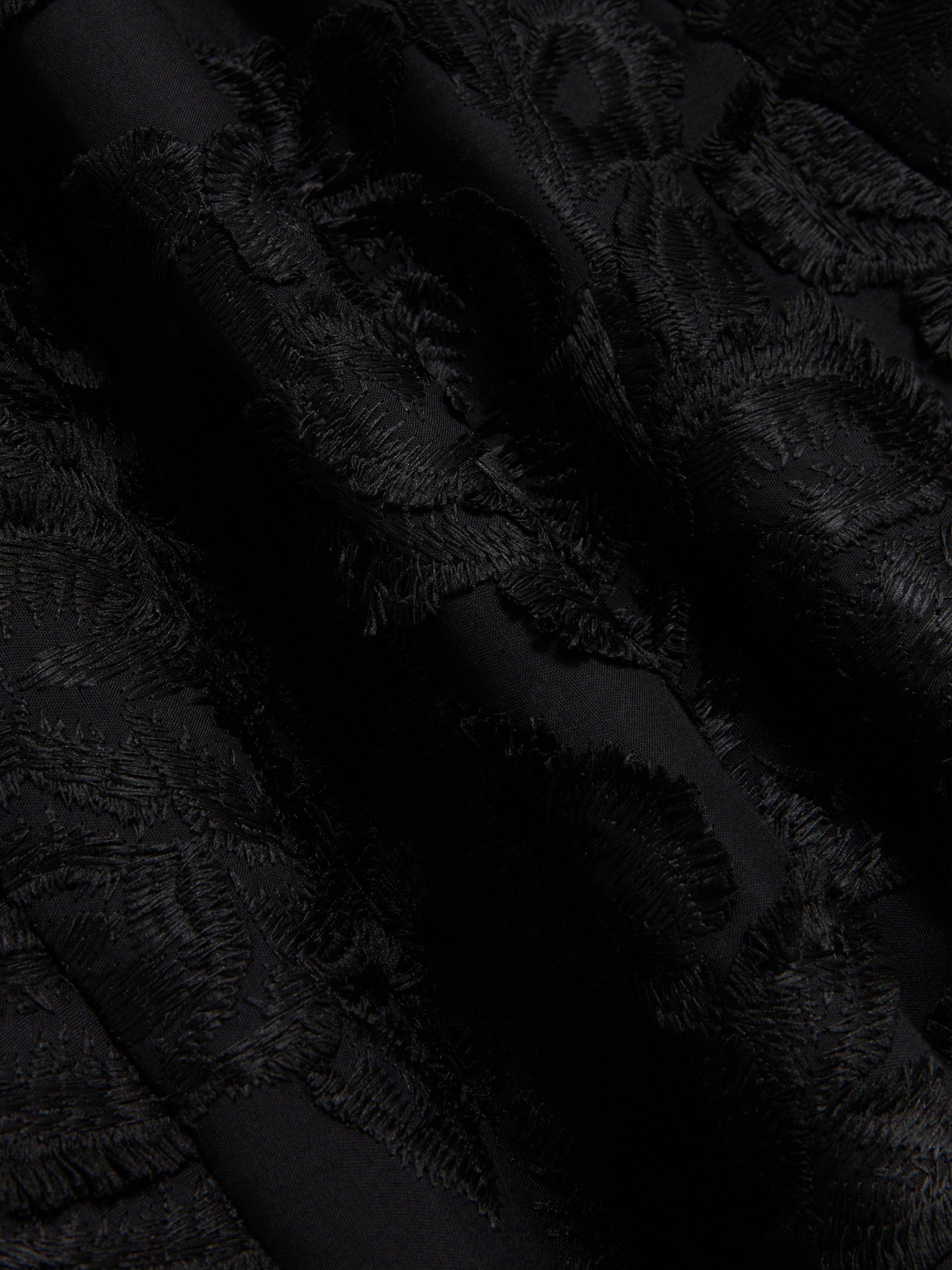 Product image 6 of 8, which shows Ted Baker Textured Rose Detail Midi Skirt, Black, 6