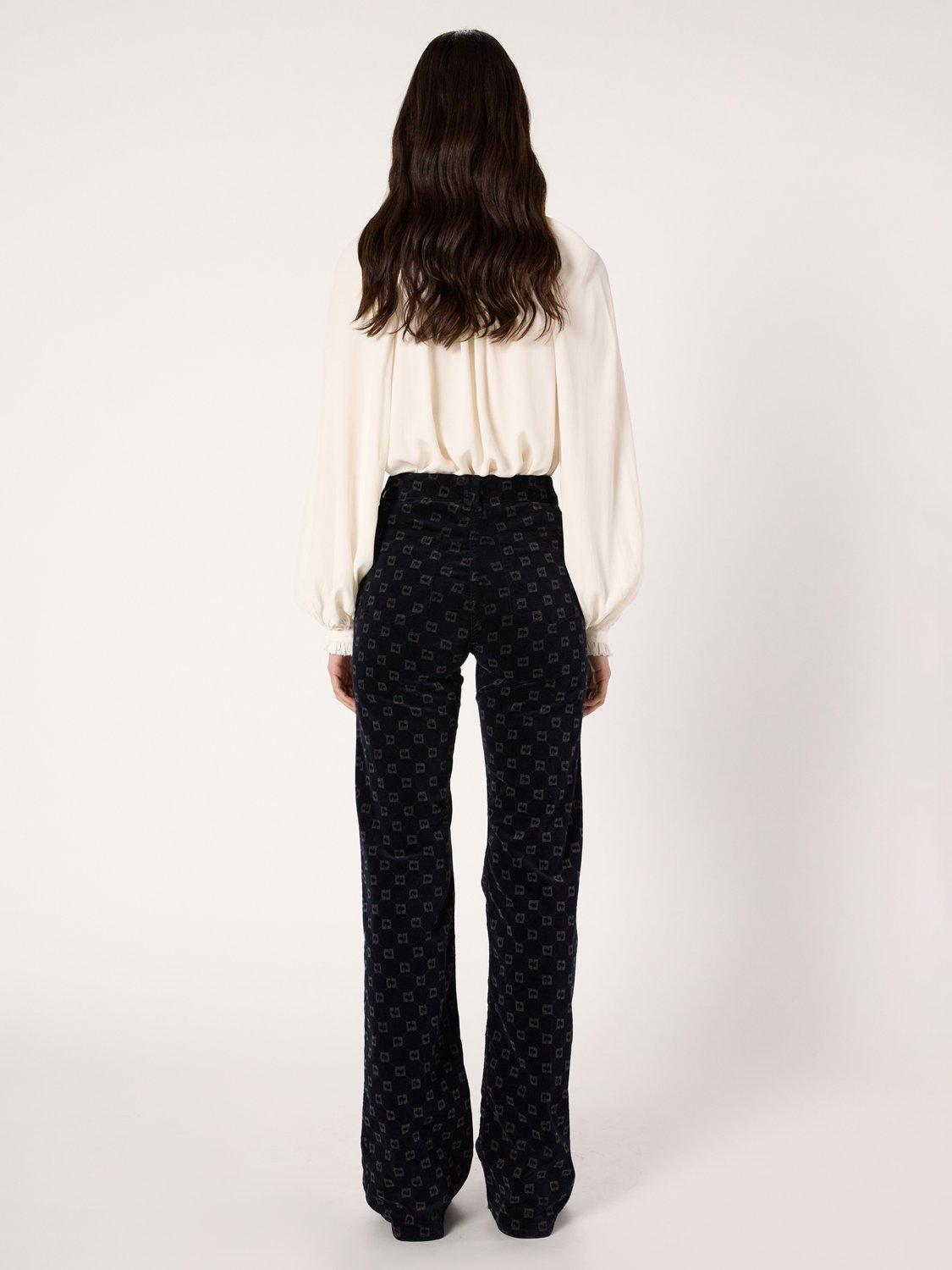 Product image 3 of 6, which shows Gerard Darel Anna Logo Print Flared Trousers, Navy, 10