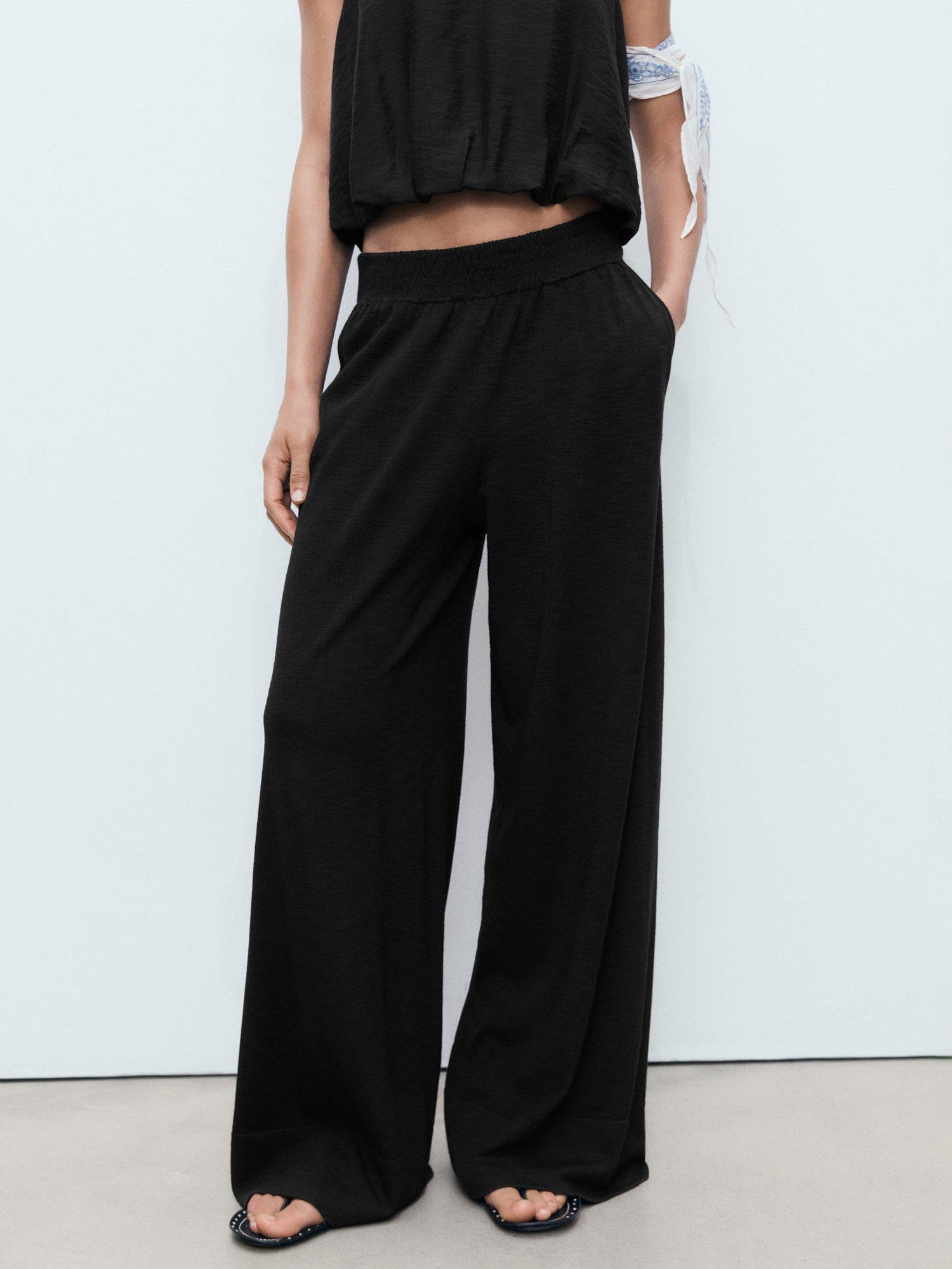 Product image 1 of 8, which shows Mango Lucrecia Fine Knit Straight Fit Trousers, Black, XS