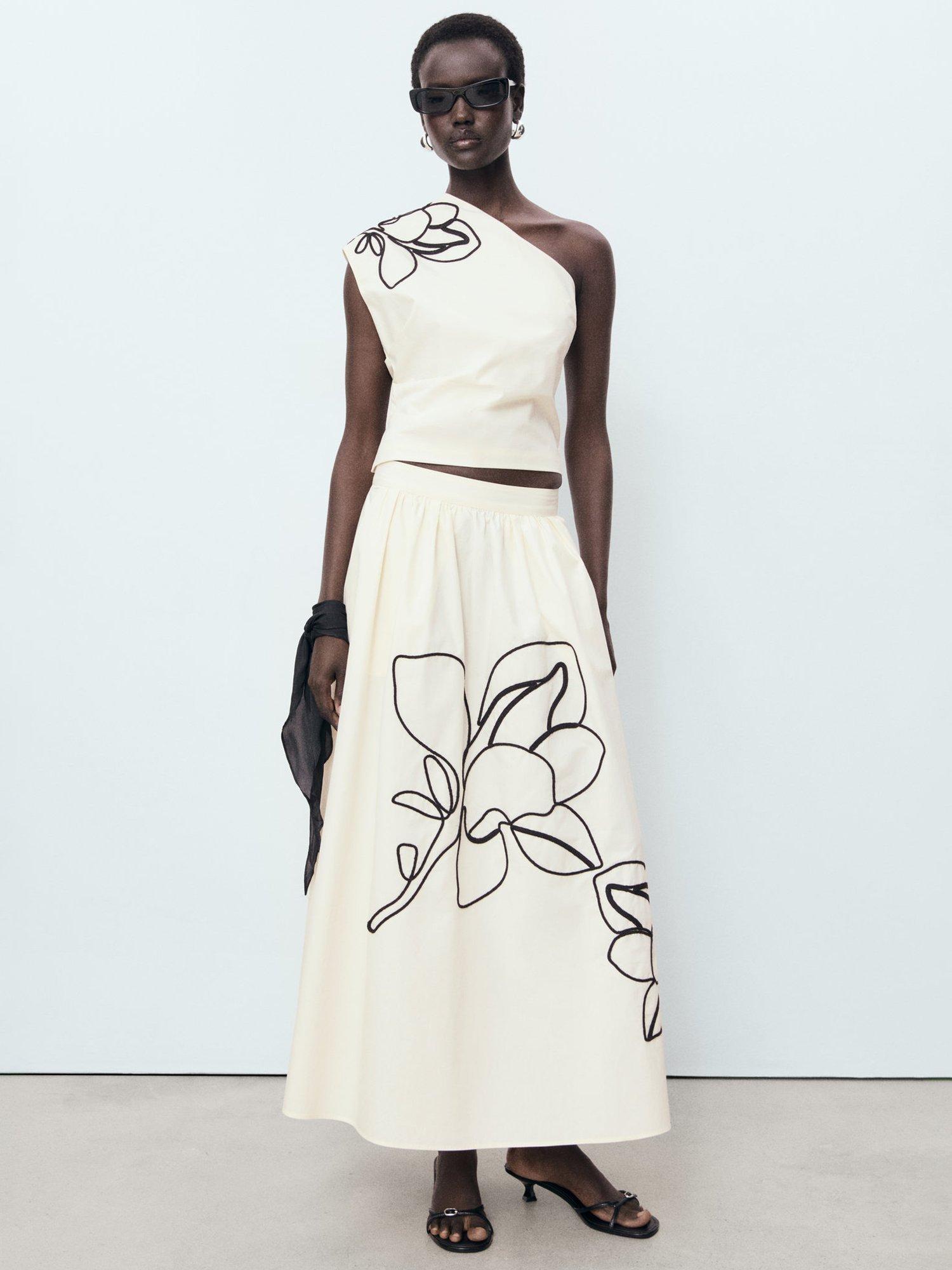 Product image 2 of 8, which shows Mango Bari Cotton Asymmetrical Flower Embroidered Top, Natural White, S