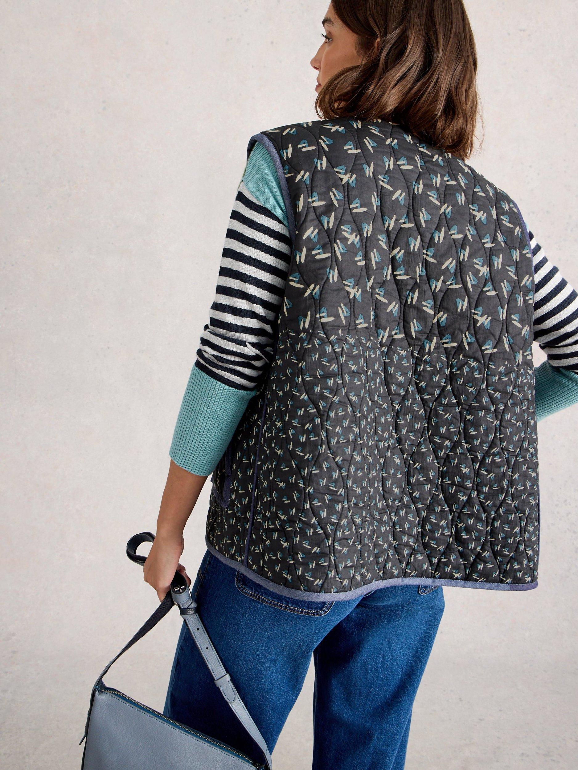 Product image 2 of 7, which shows White Stuff Carla Organic Cotton Reversible Gilet, Blue/Multi, S