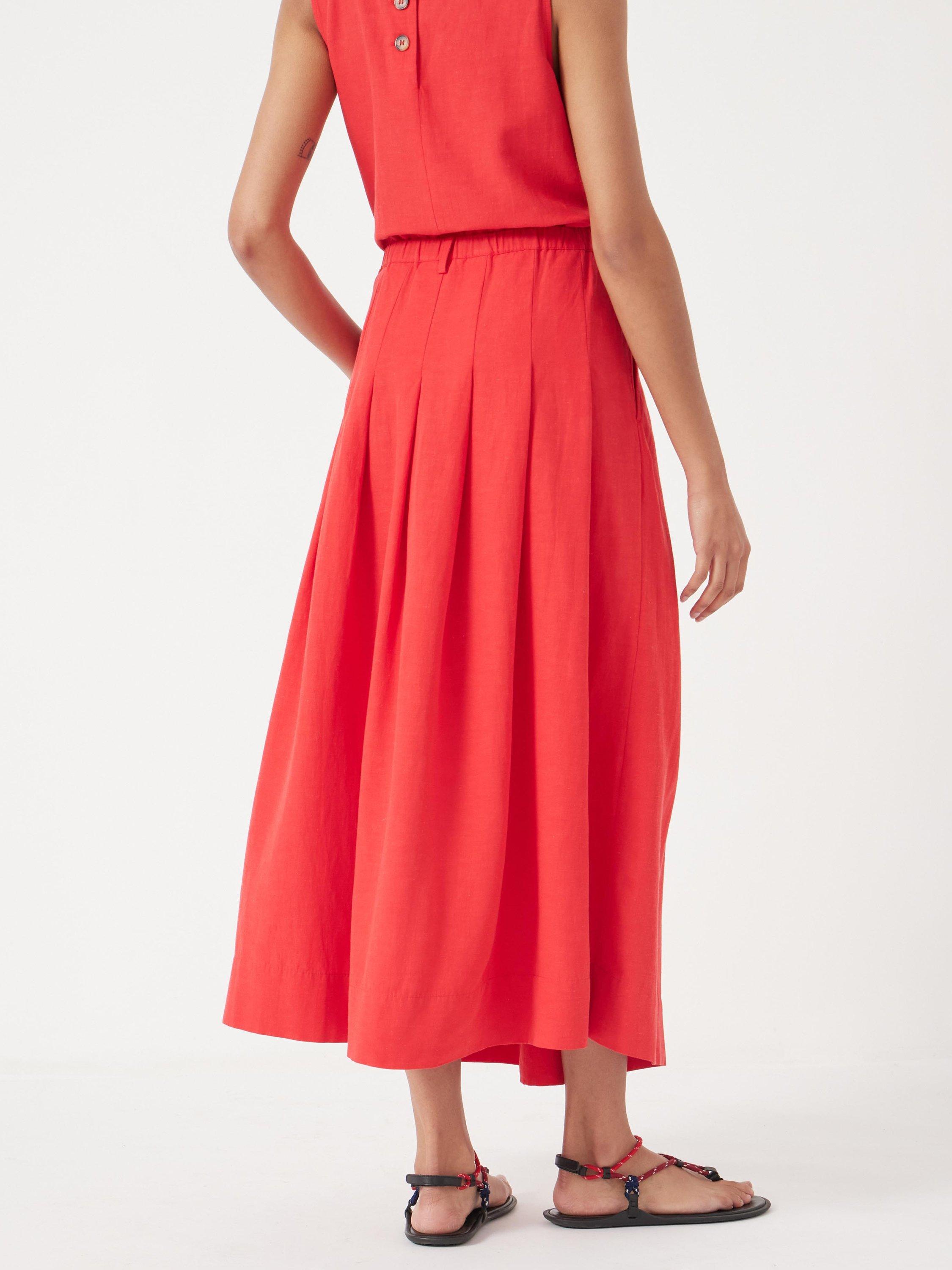 Product image 3 of 5, which shows HUSH Ivy Pleated Midi Skirt containing LENZING™ ECOVERO™ Viscose, True Red, 10