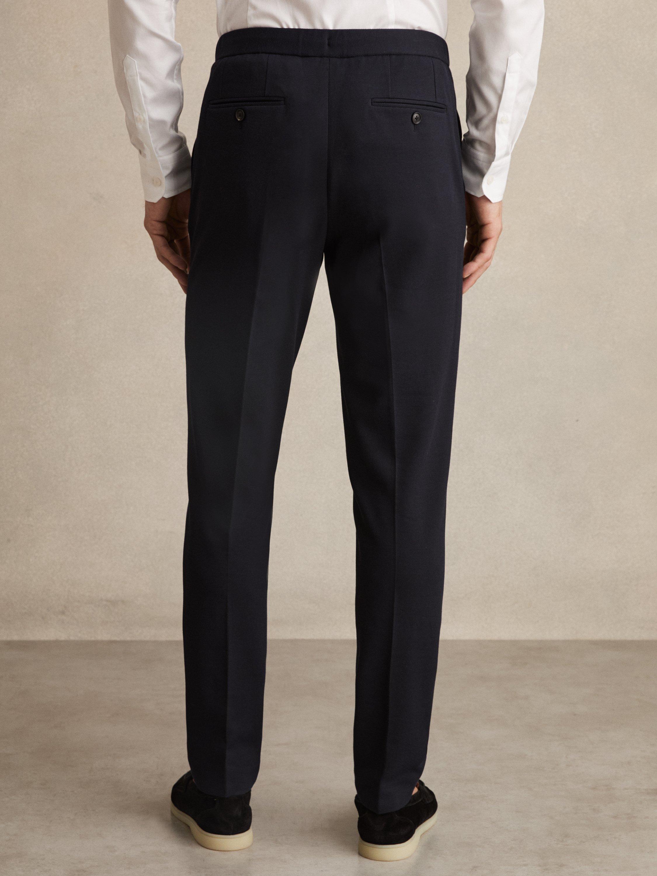 Product image 5 of 5, which shows Reiss Gerrard Slim Fit Jersey Drawstring Suit Trousers, Navy, 28R