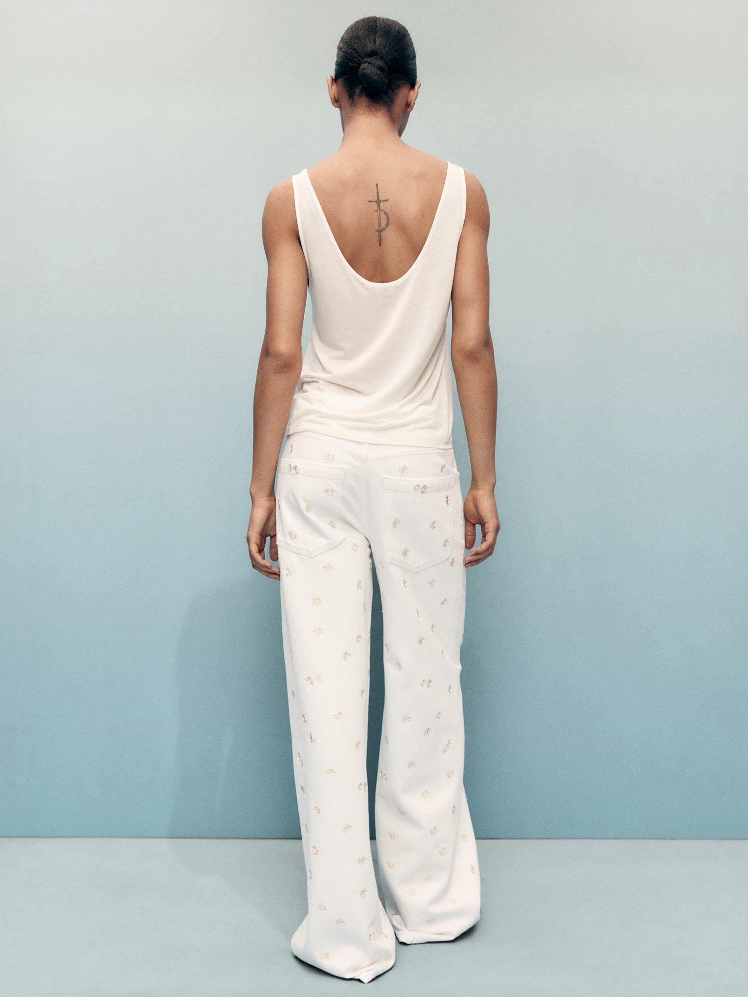 Product image 4 of 7, which shows Mango Massy Cotton Flower Embroidered Wide Leg Jeans, Natural White, 10