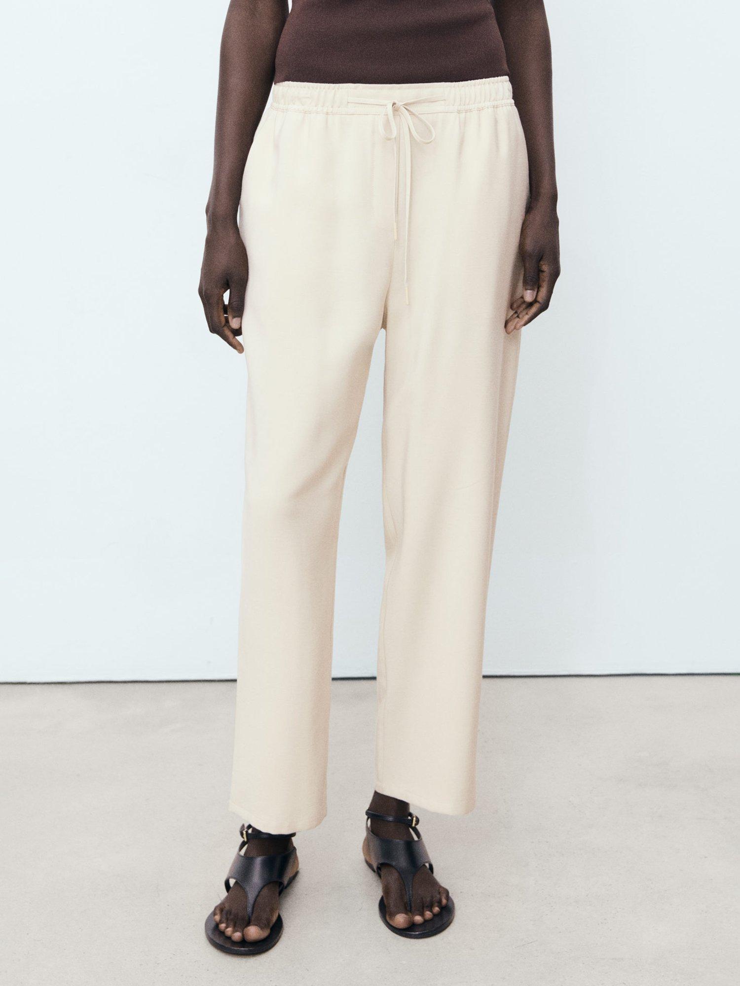 Product image 1 of 8, which shows Mango Fluido Drawstring Waist Trousers, Light Beige, XS
