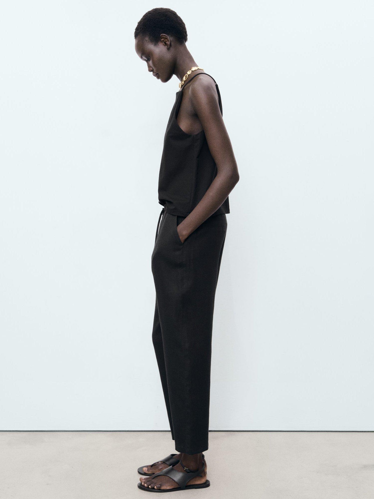 Product image 6 of 7, which shows Mango Mid Rise Drawstring Pure Linen Trousers, Black, XS