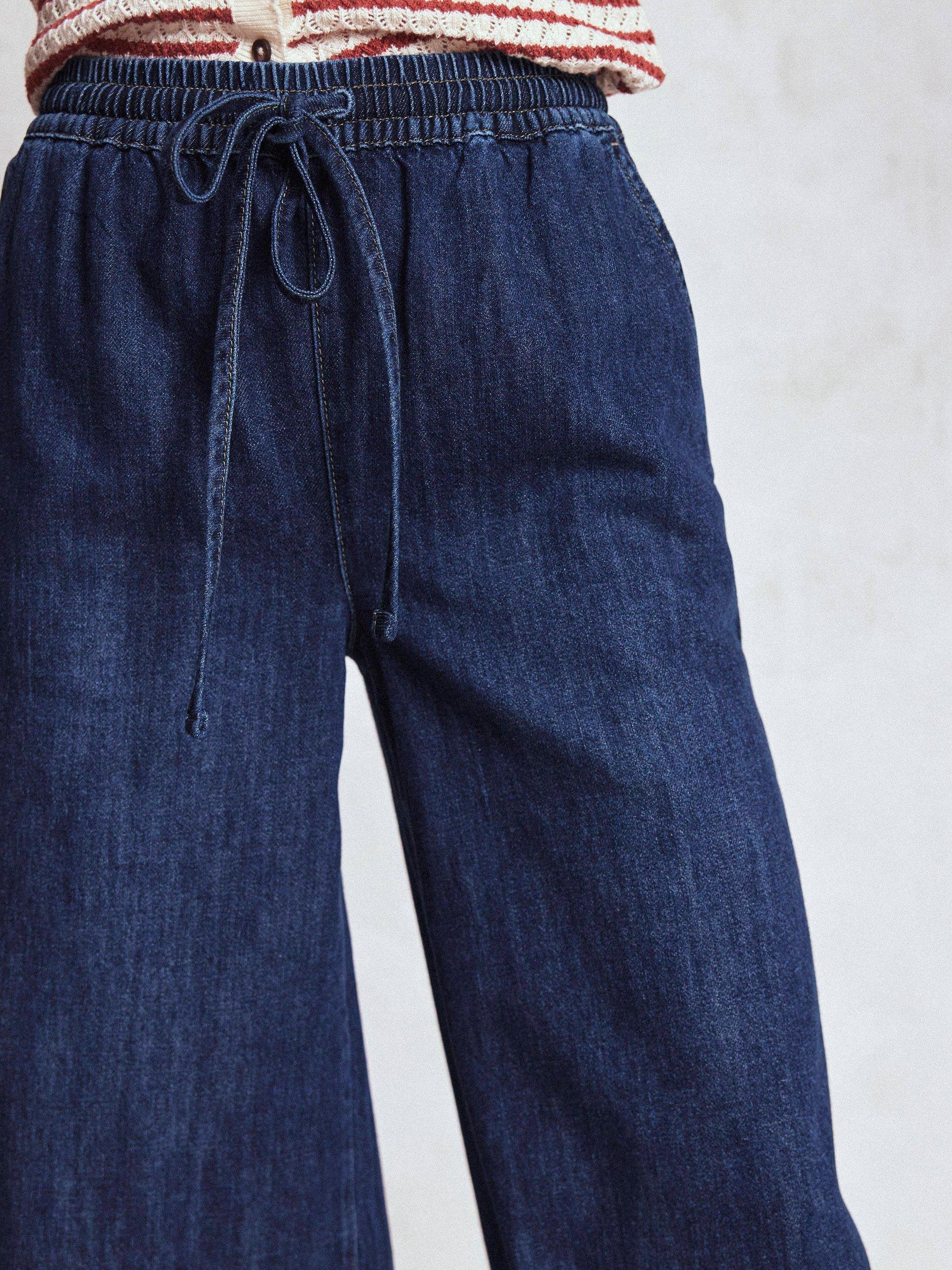 Product image 5 of 7, which shows Boden Drawcord Denim Trousers, Mid Wash, 12