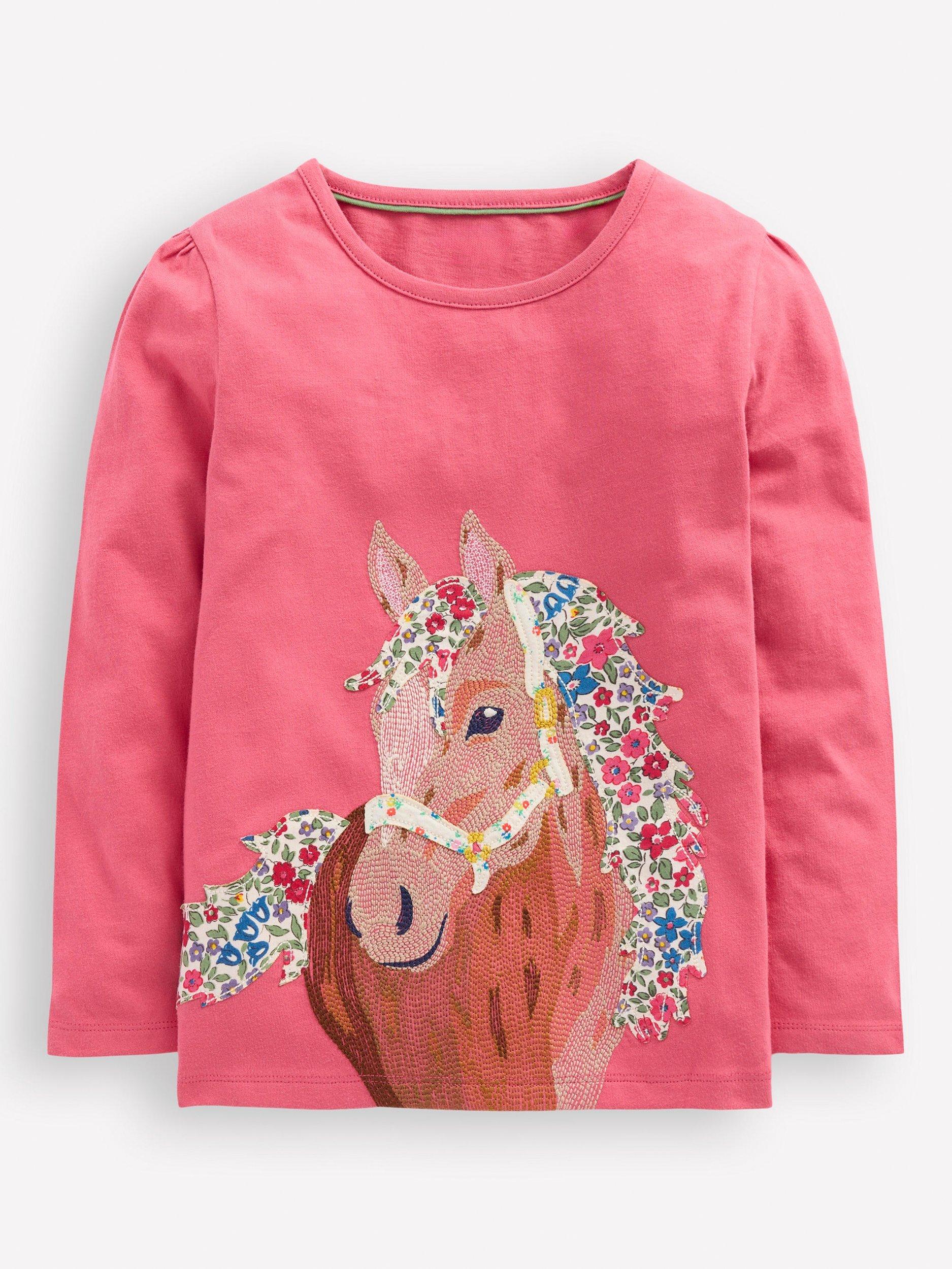 Product image 1 of 2, which shows Mini Boden Kids' Cotton Long Sleeved T-Shirt, Rose Pink Horses, 2-3 years