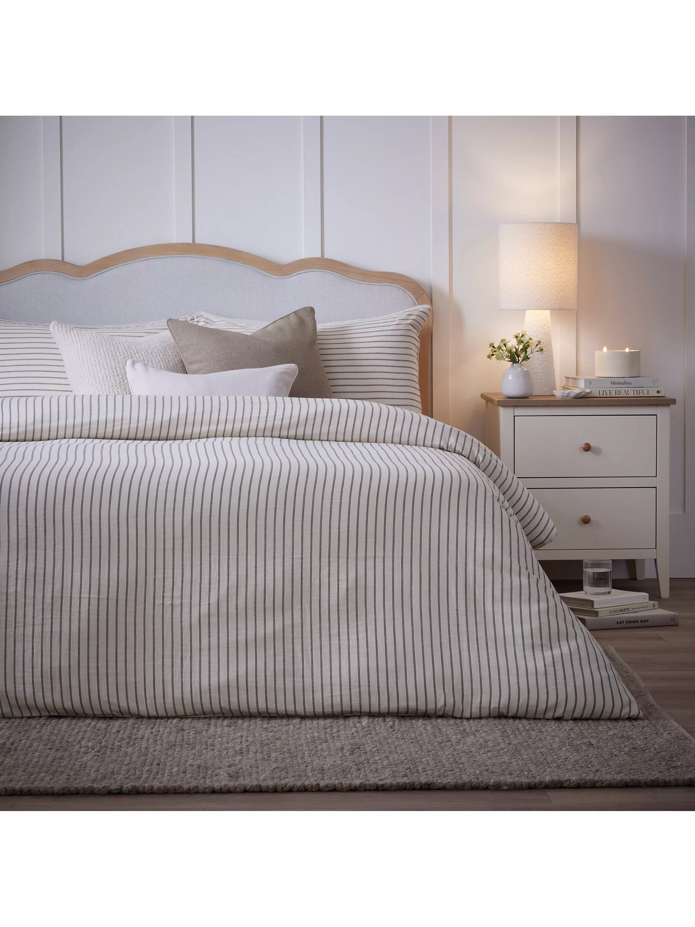 Blue pans with gold handles stacked together