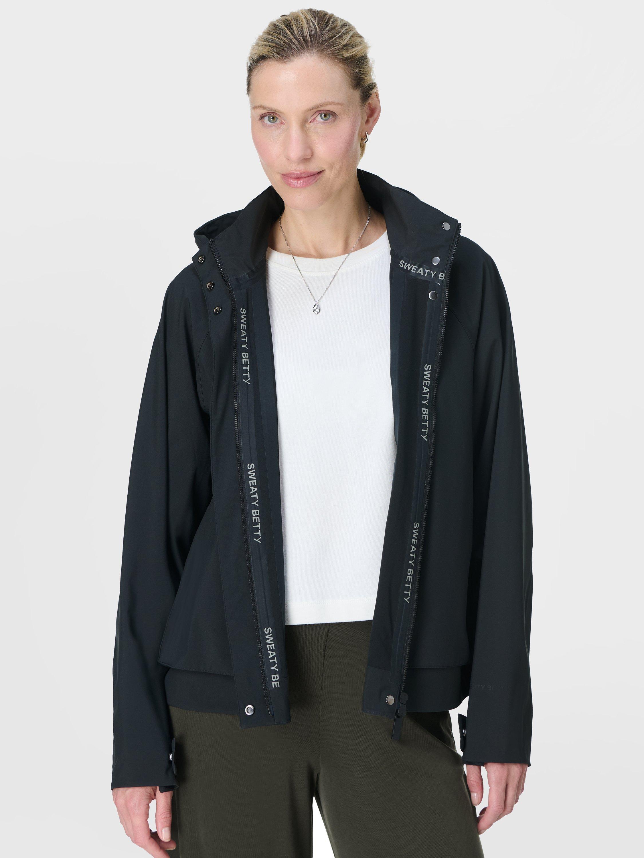 Product image 1 of 7, which shows Sweaty Betty Motion Waterproof Cropped Parka, Black, XXS