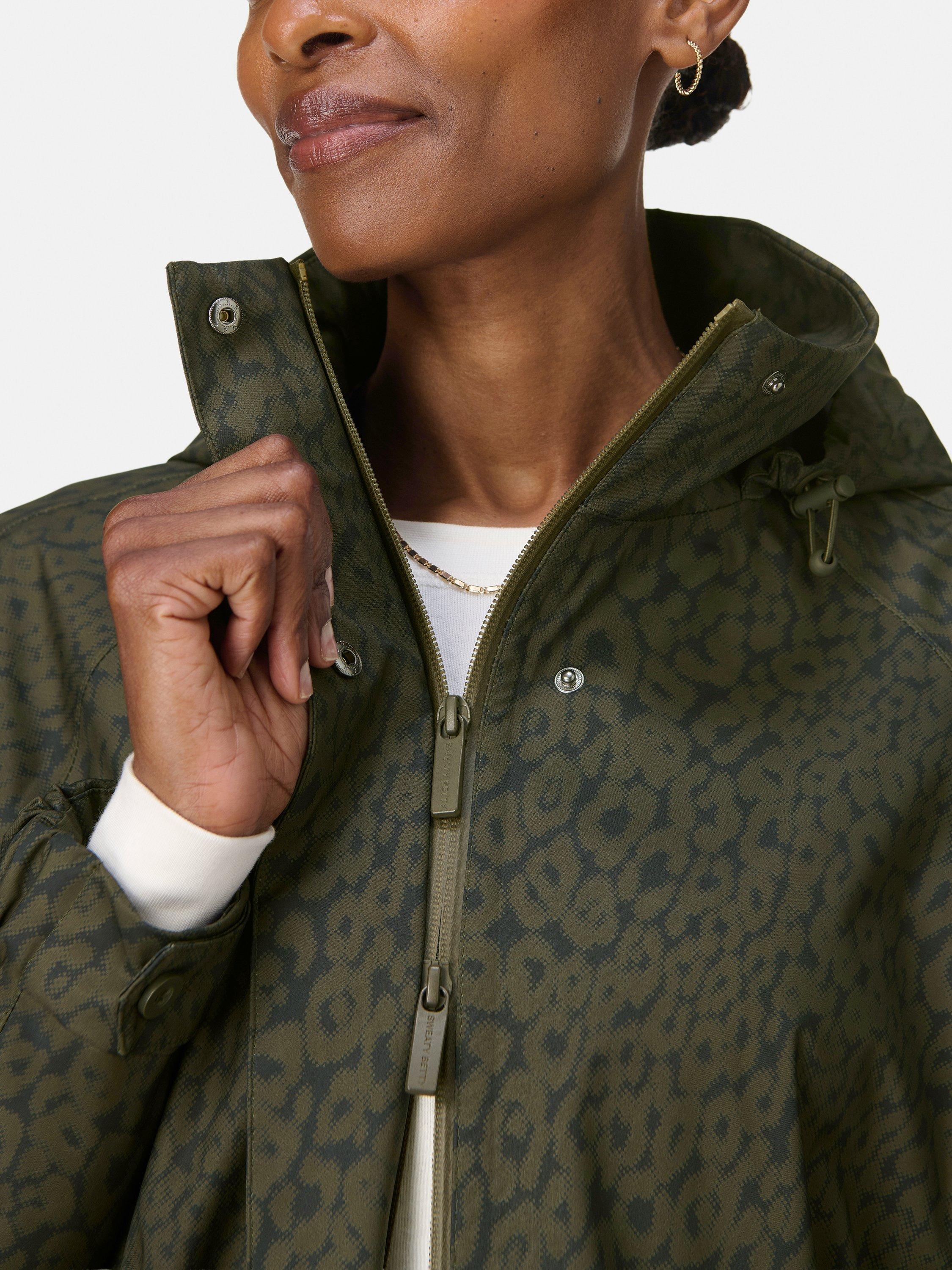 Product image 4 of 9, which shows Sweaty Betty Motion Technical Longline Parka, Green Leopard, S