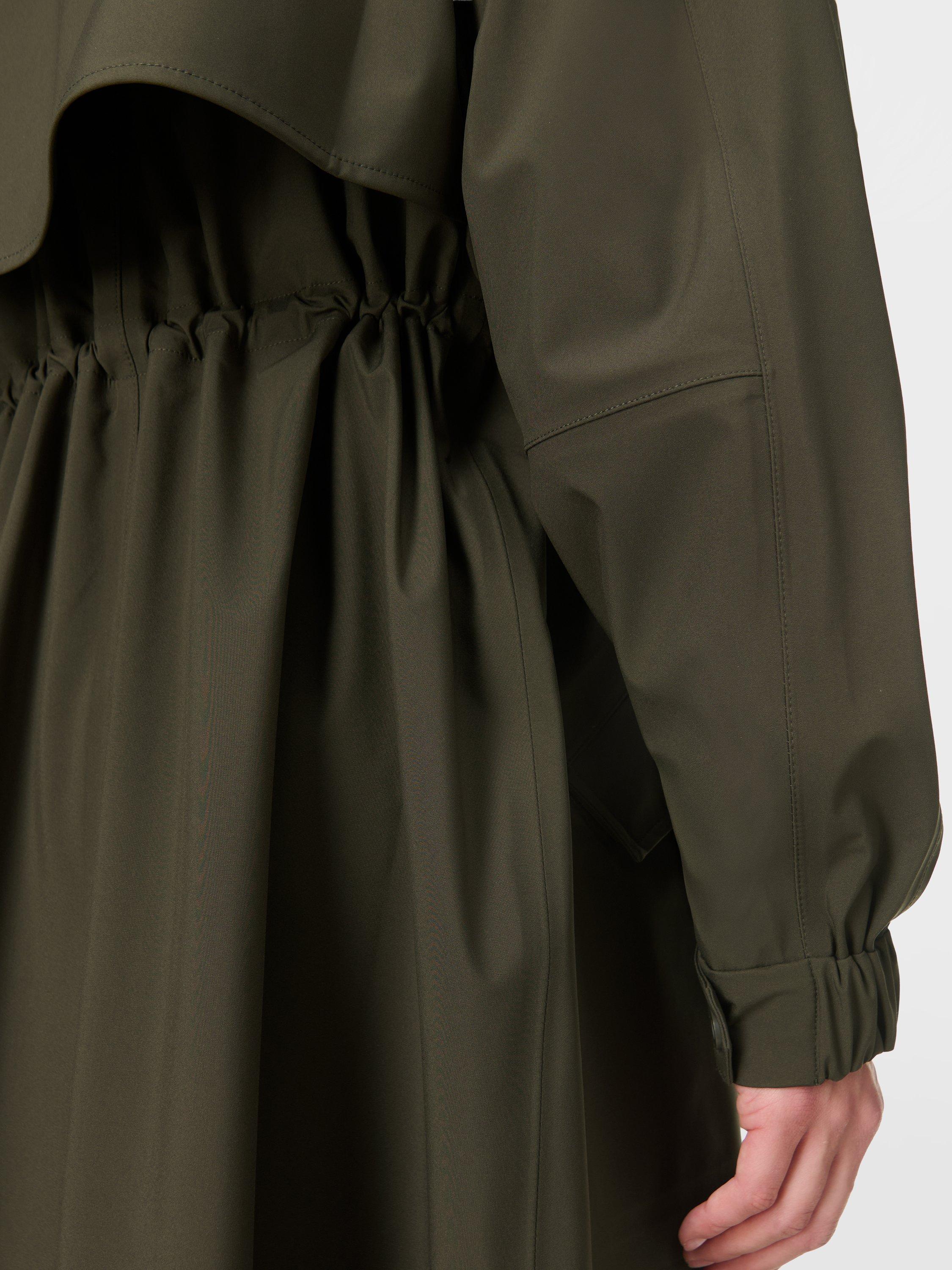 Product image 5 of 9, which shows Sweaty Betty Motion Technical Longline Parka, Nori Green, XXS