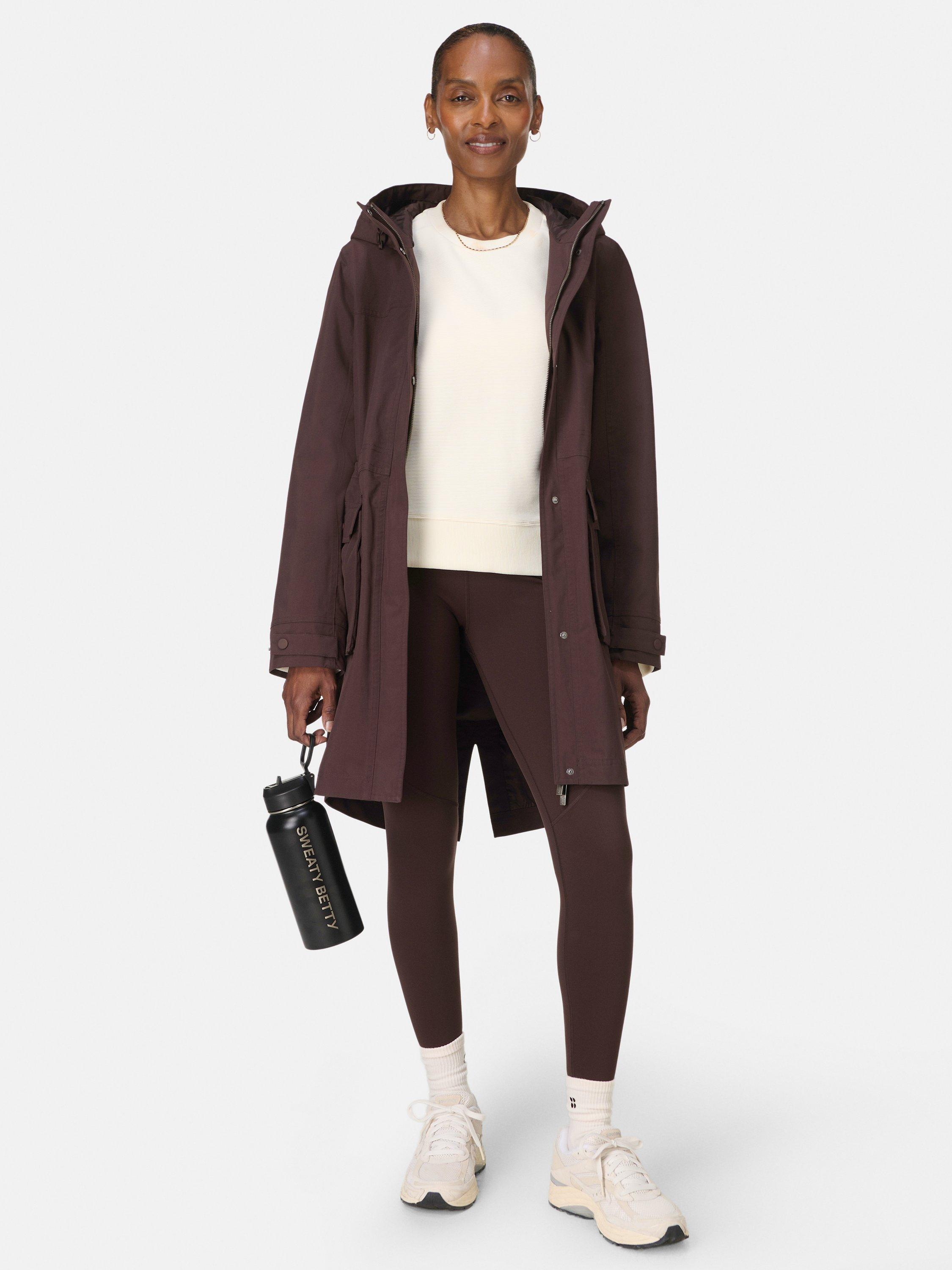 Product image 1 of 10, which shows Sweaty Betty Stride Waterproof Parka, Sable Brown, S