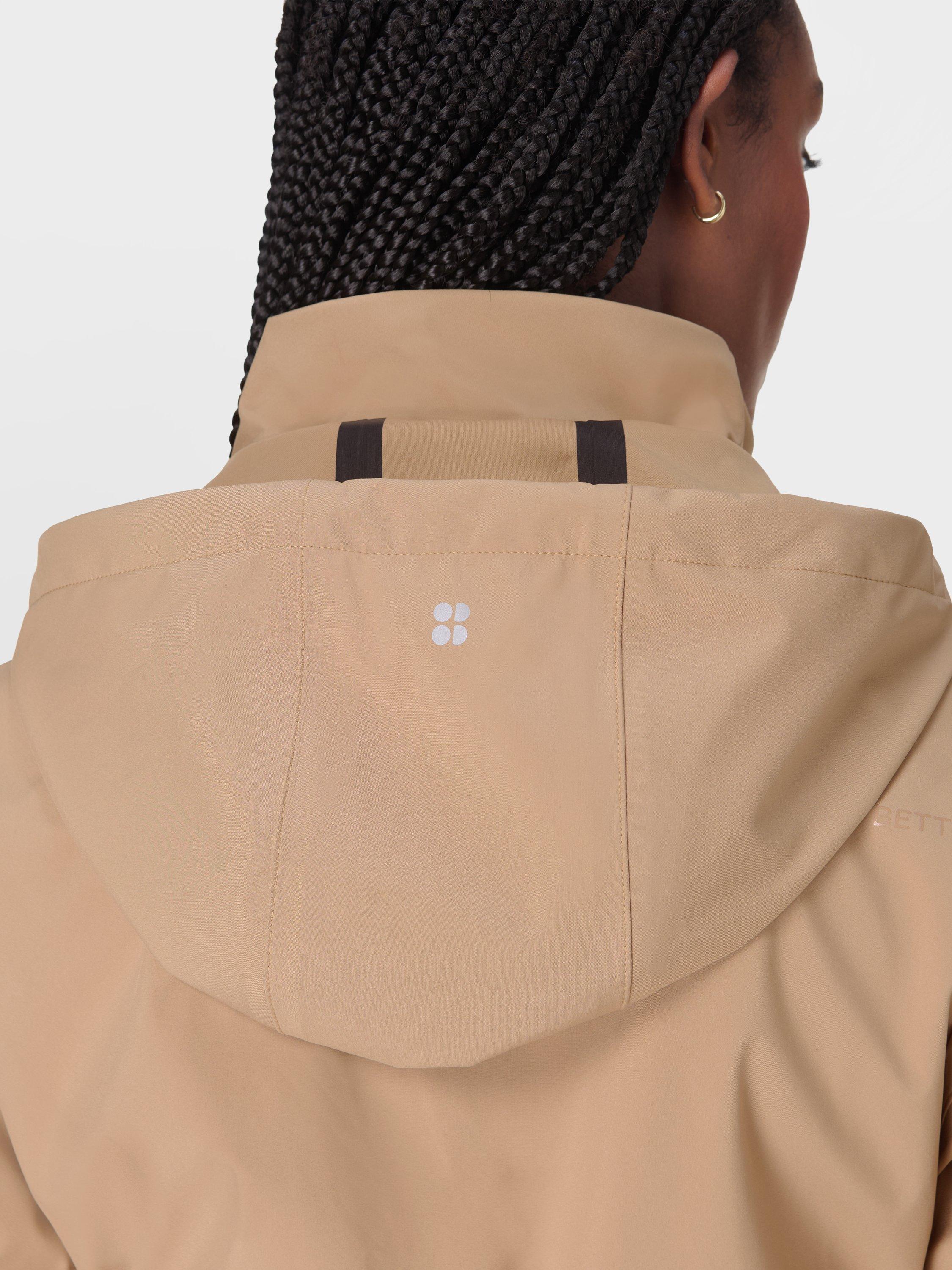 Product image 4 of 8, which shows Sweaty Betty Guide Waterproof Parka Coat, Golden Beige, S