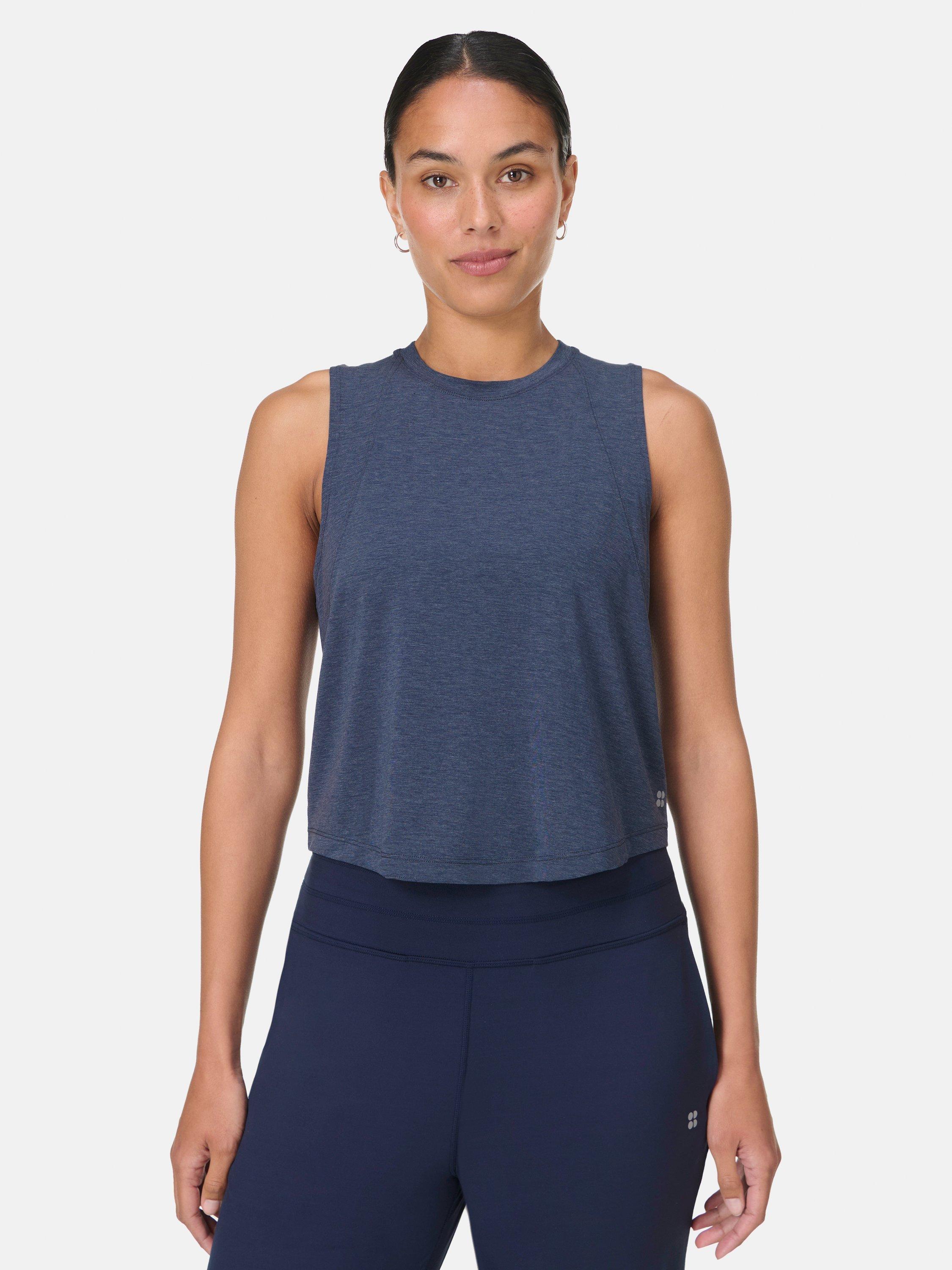 Product image 1 of 6, which shows Sweaty Betty Soft Flow Studio Twist Back Tank Top, Navy Blue, XXS