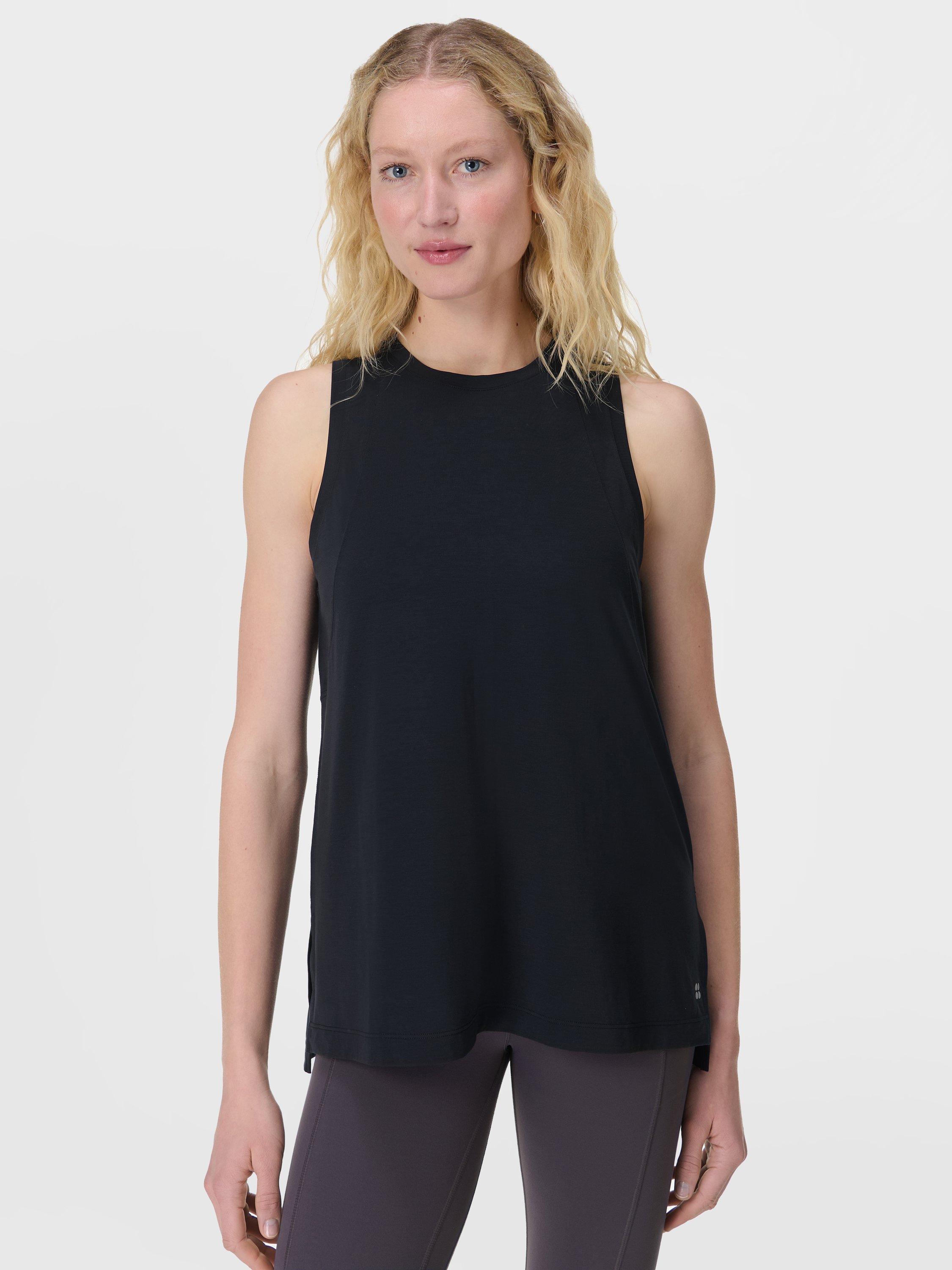 Product image 1 of 8, which shows Sweaty Betty Soft Flow Studio Longline Tank Top, Black, XXS