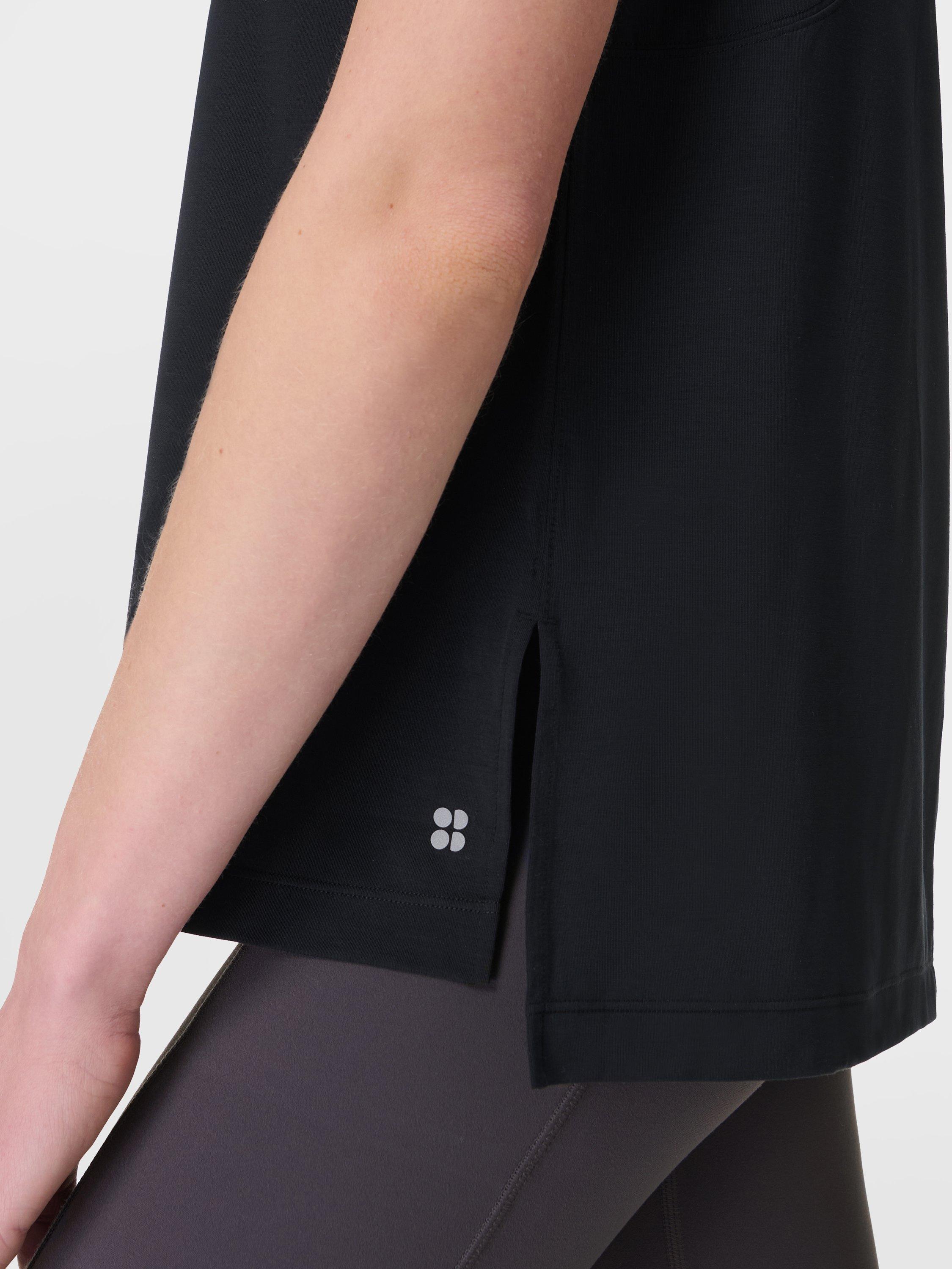 Product image 6 of 8, which shows Sweaty Betty Soft Flow Studio Longline Tank Top, Black, XXS