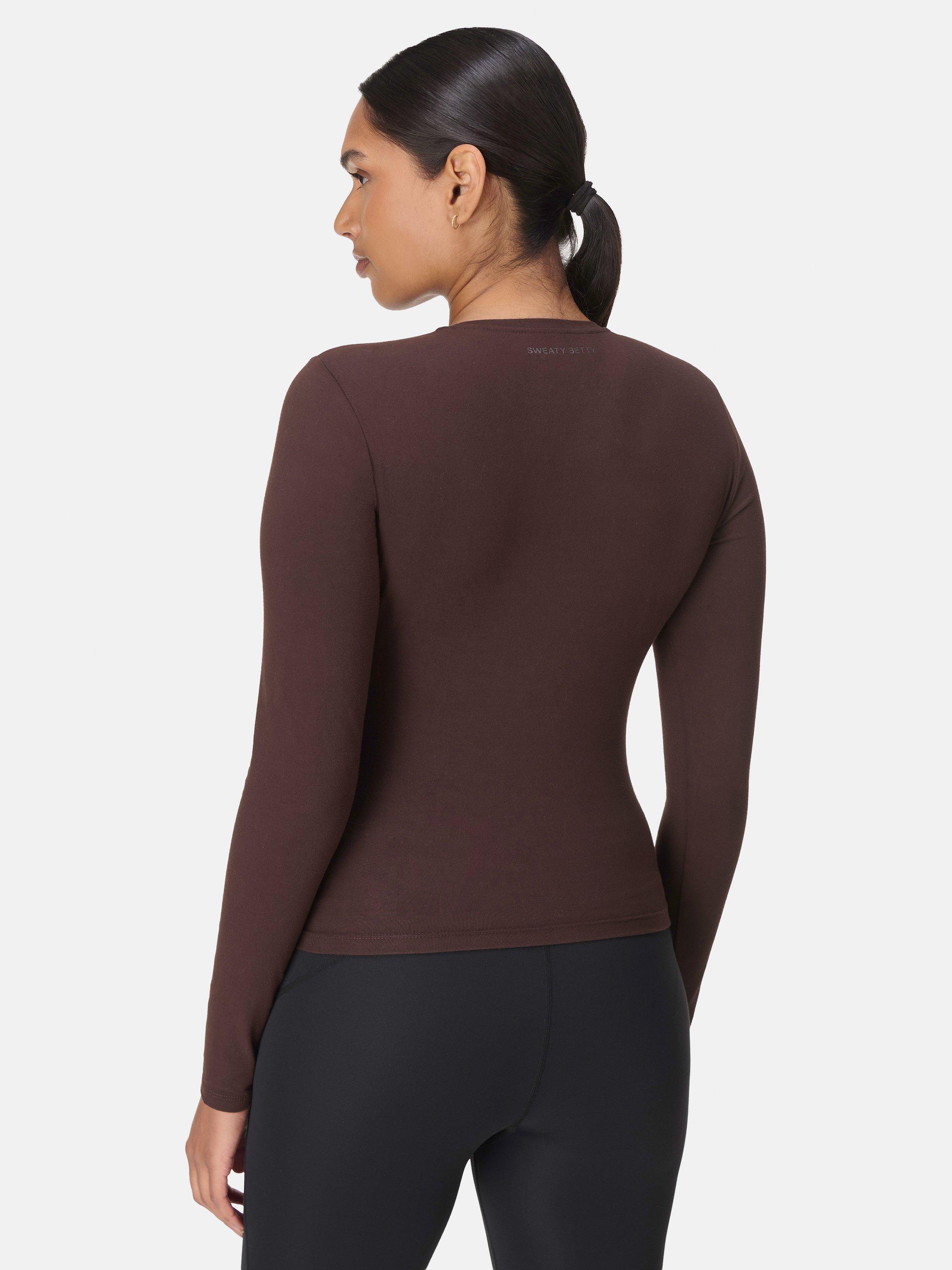 Product image 4 of 7, which shows Sweaty Betty Essential Sculpt Long Sleeve Top, Sable Brown, XXS