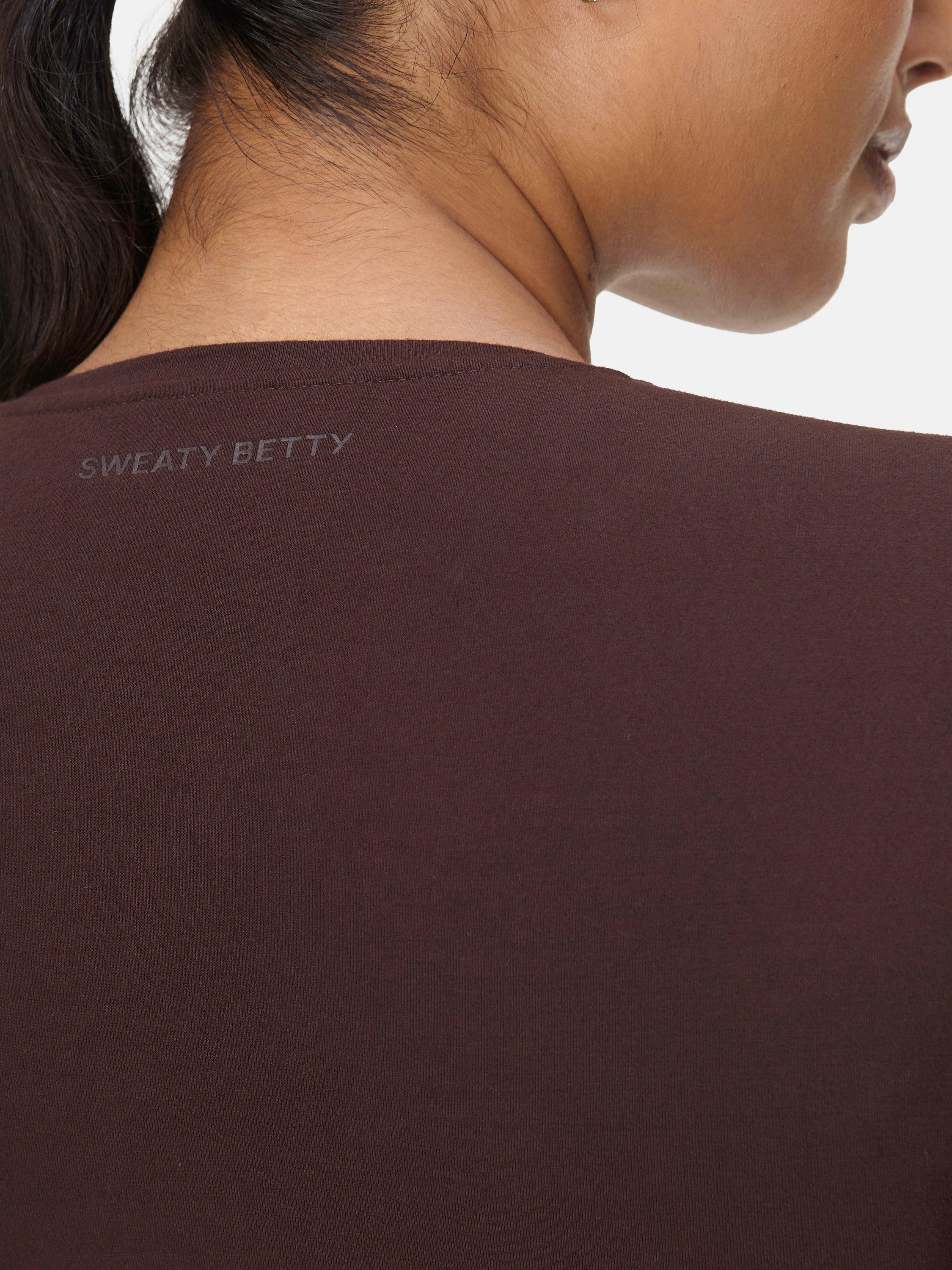 Product image 6 of 7, which shows Sweaty Betty Essential Sculpt Long Sleeve Top, Sable Brown, XXS