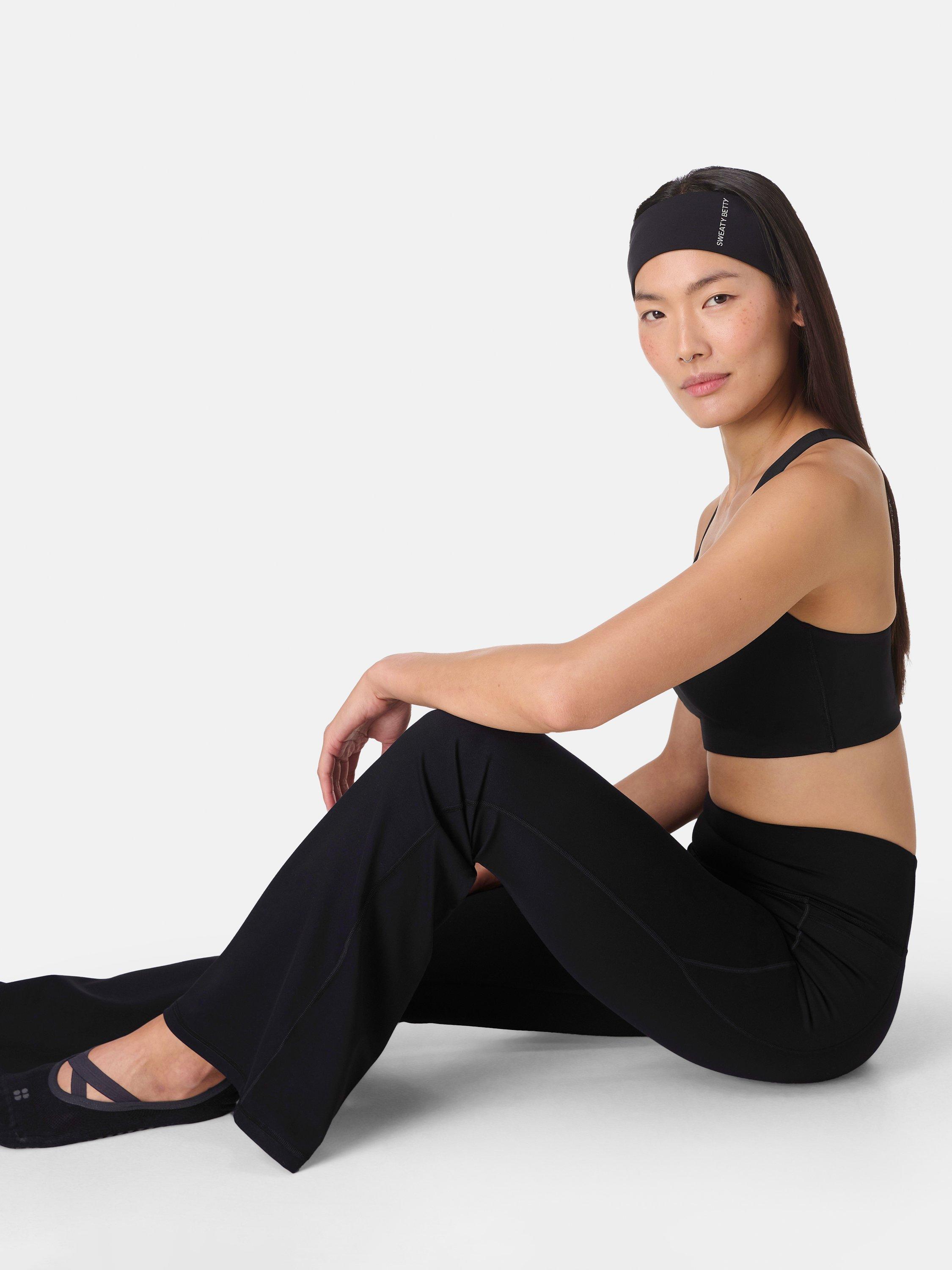 Product image 2 of 7, which shows Sweaty Betty Ultimate Studio 30" Flare Trousers, Black, XXS