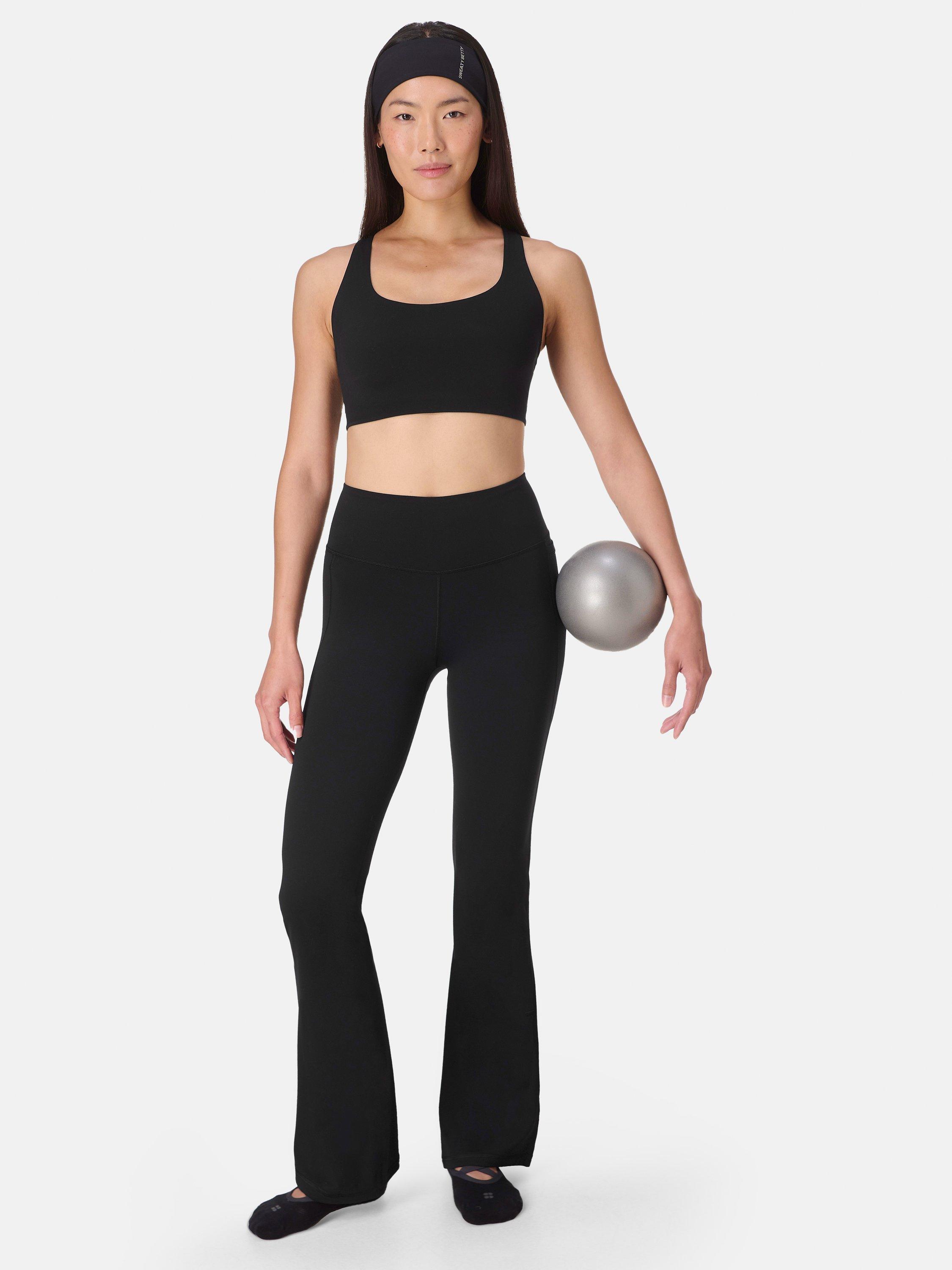 Product image 3 of 7, which shows Sweaty Betty Ultimate Studio 30" Flare Trousers, Black, XXS