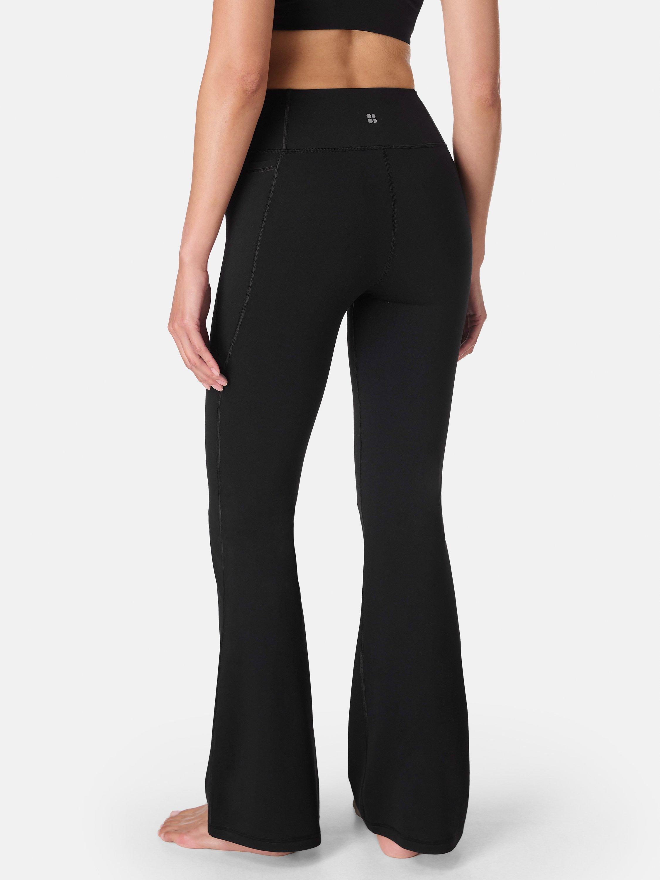 Product image 4 of 7, which shows Sweaty Betty Ultimate Studio 30" Flare Trousers, Black, XXS