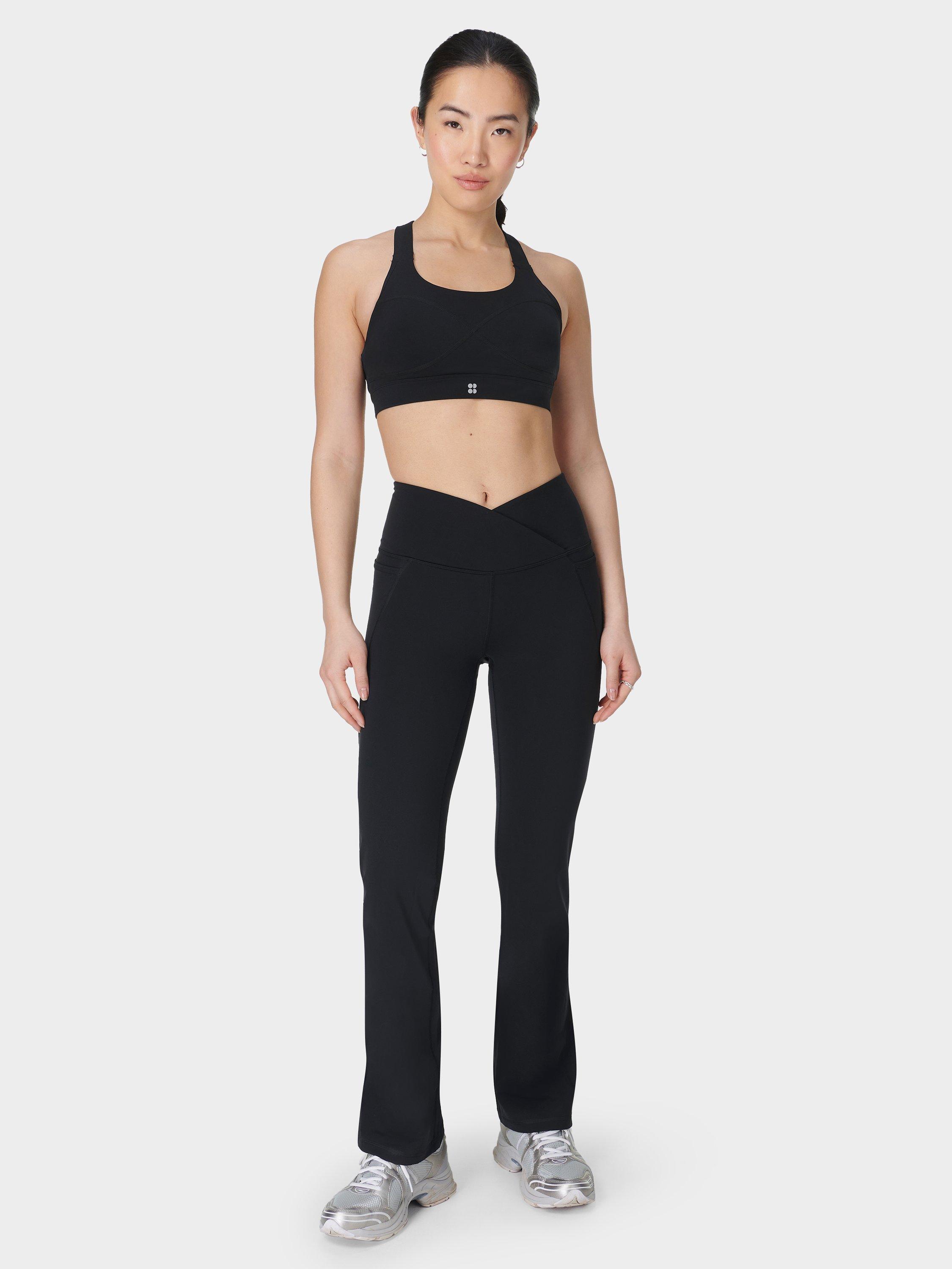 Product image 3 of 11, which shows Sweaty Betty Power Wrap Waist Bootcut 32" Workout Trousers, Black, S