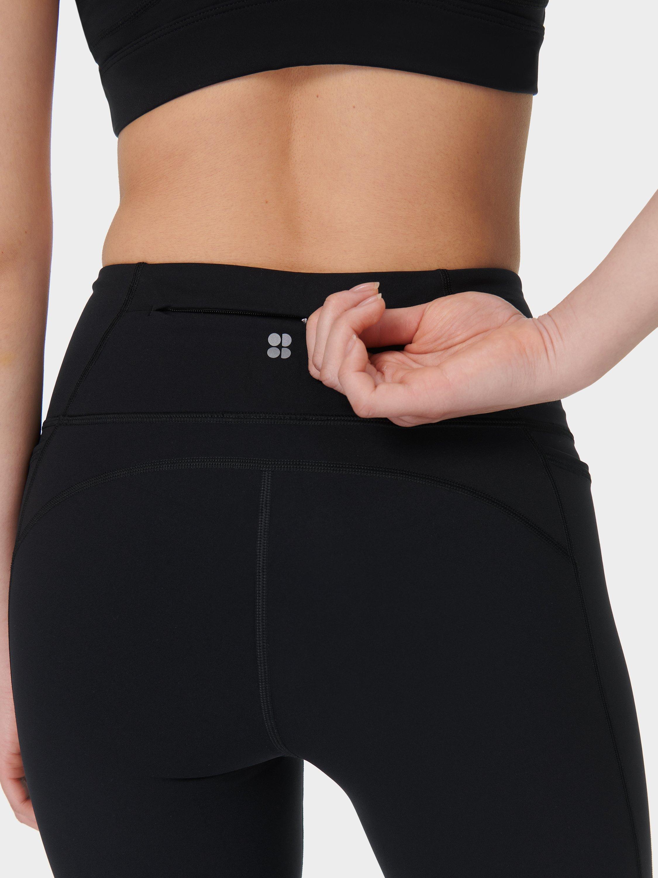 Product image 5 of 11, which shows Sweaty Betty Power Wrap Waist Bootcut 32" Workout Trousers, Black, S