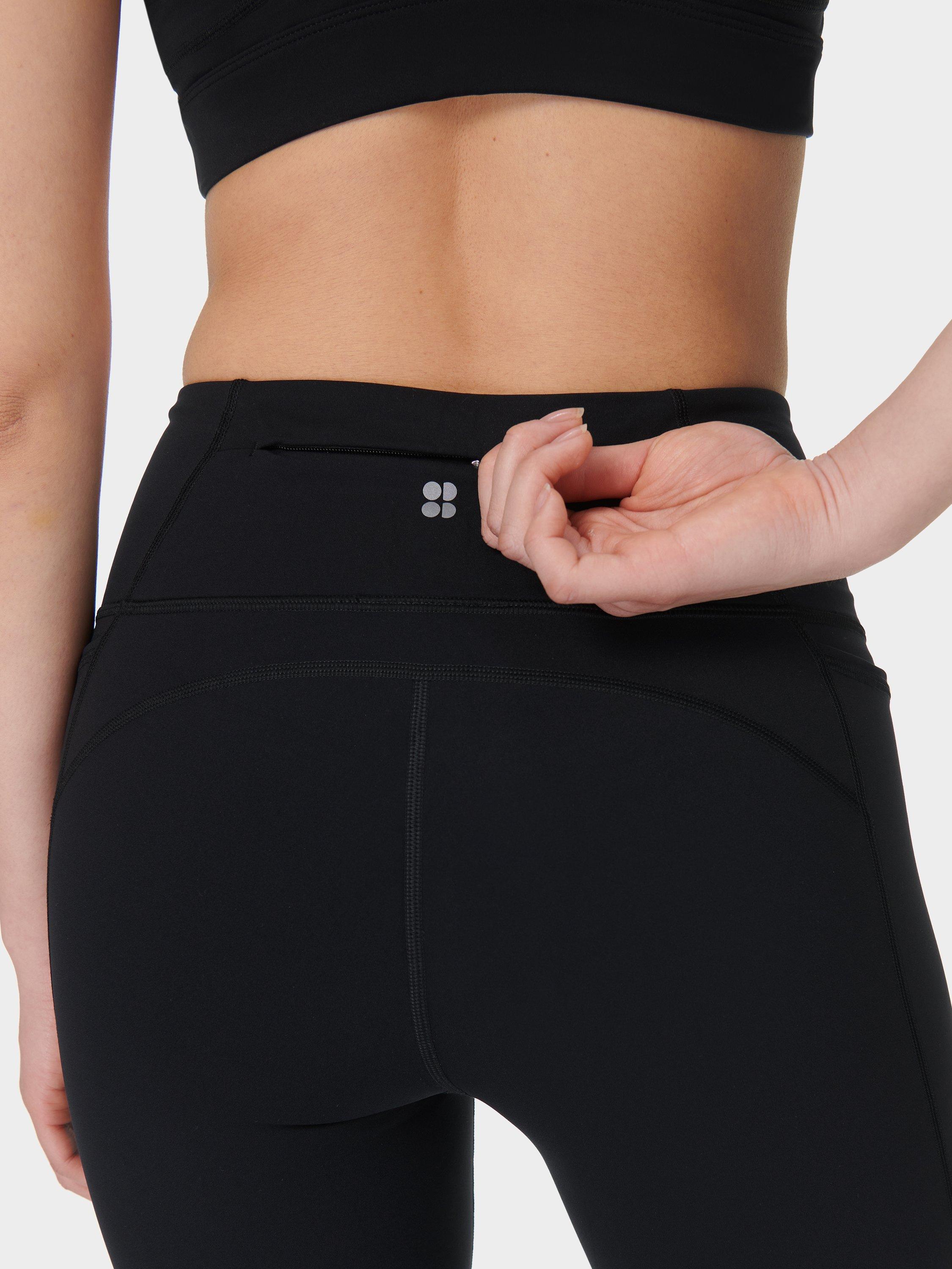 Product image 7 of 11, which shows Sweaty Betty Power Wrap Waist Bootcut 32" Workout Trousers, Black, S