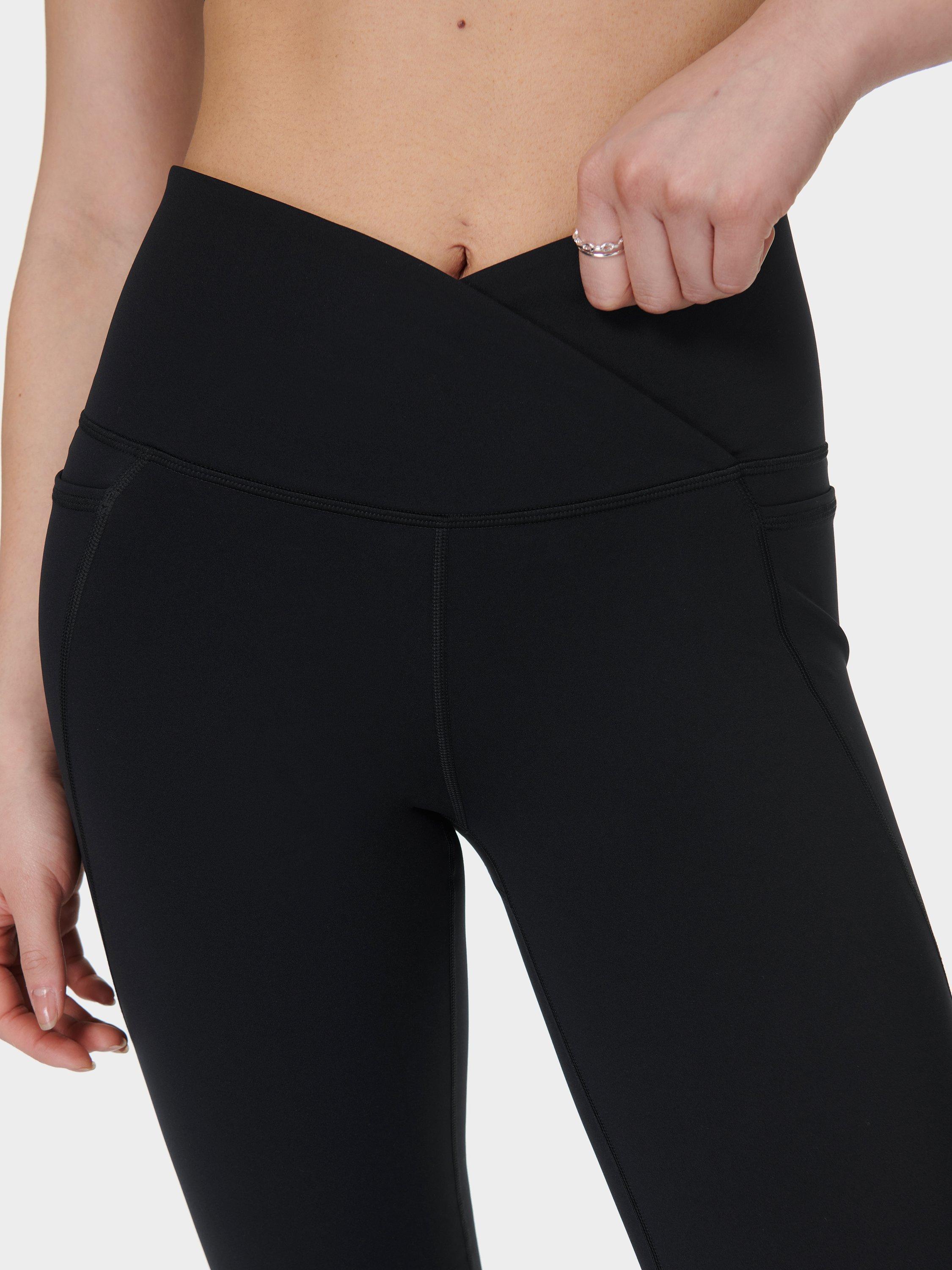 Product image 8 of 11, which shows Sweaty Betty Power 30" Wrap Waist Bootcut Workout Trousers, Black, XS